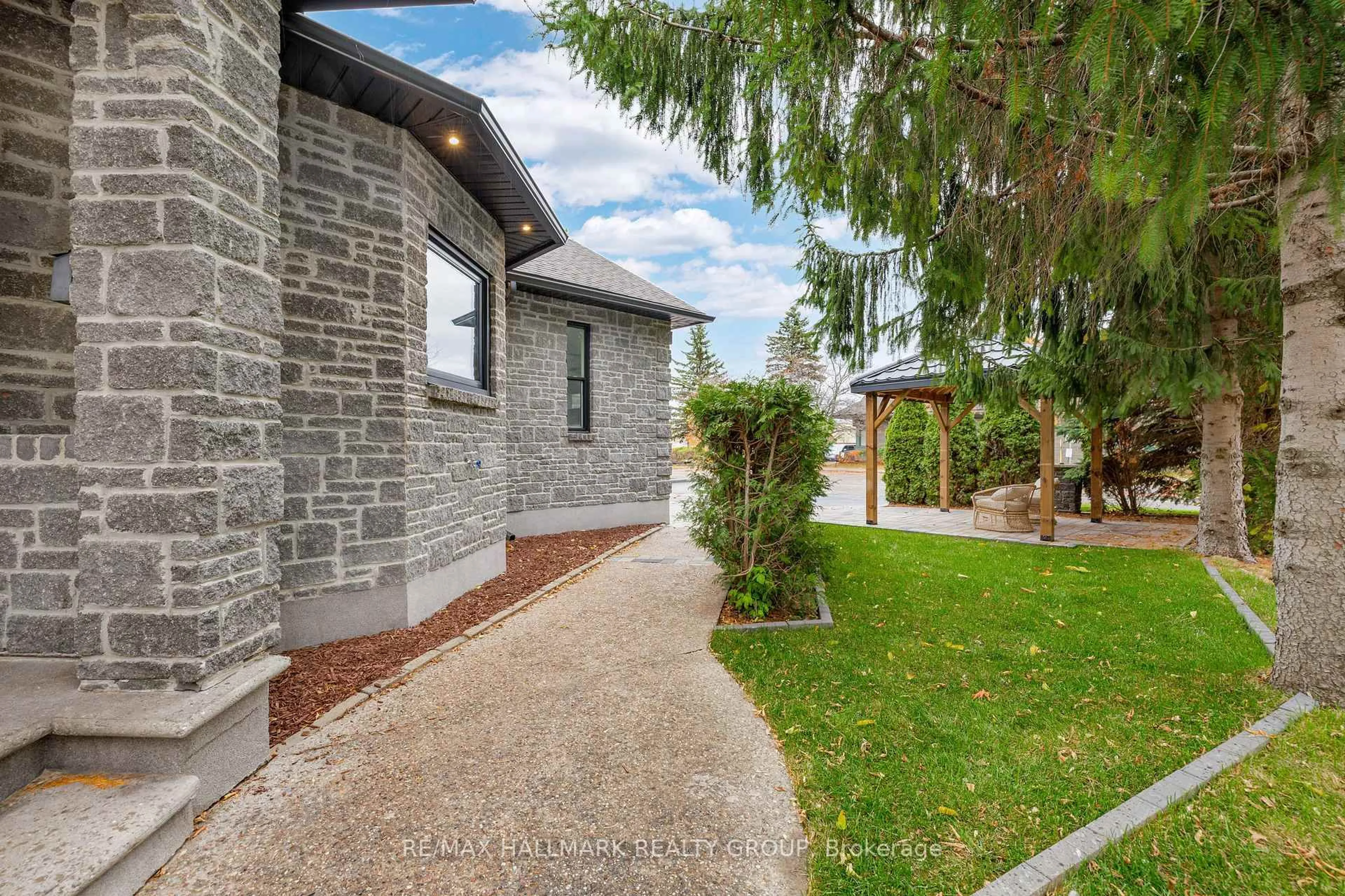 Home with brick exterior material, street for 7 Bachman Terr, Ottawa Ontario K2L 1W2