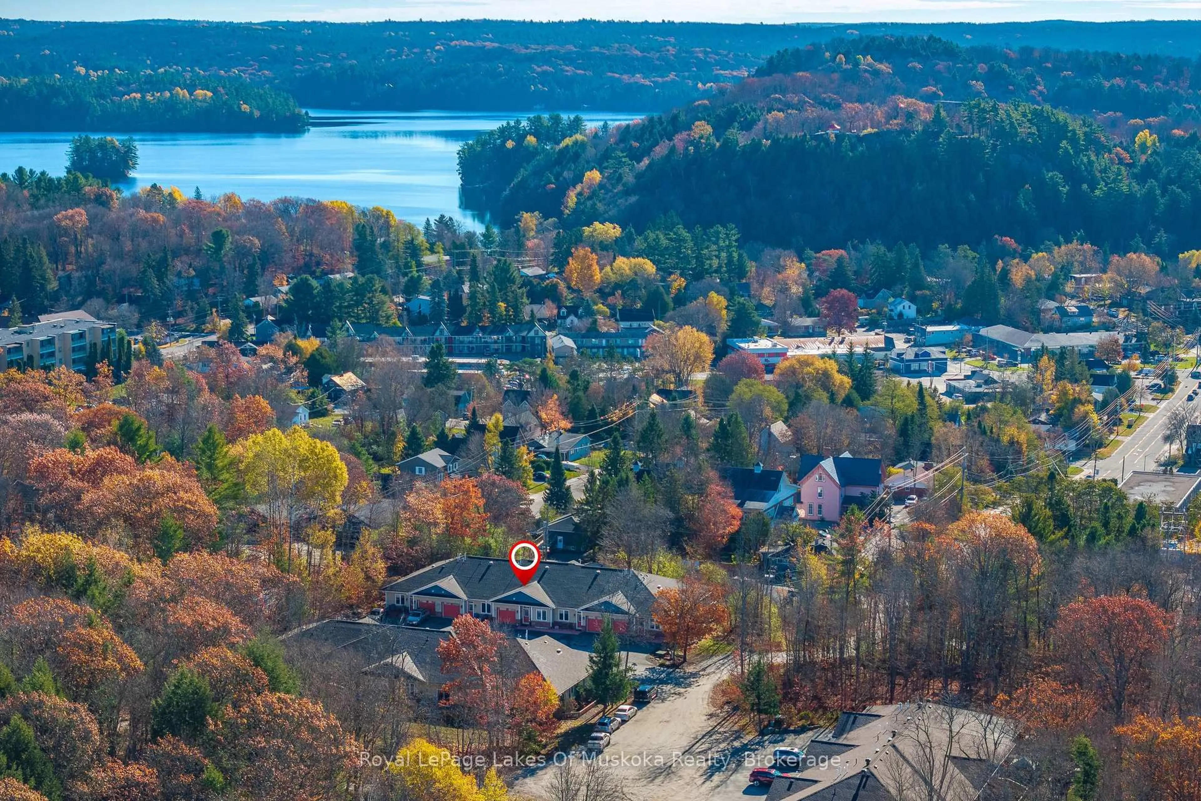 A pic from outside/outdoor area/front of a property/back of a property/a pic from drone, water/lake/river/ocean view for 5 Jordan Lane #8, Huntsville Ontario P1H 1K9