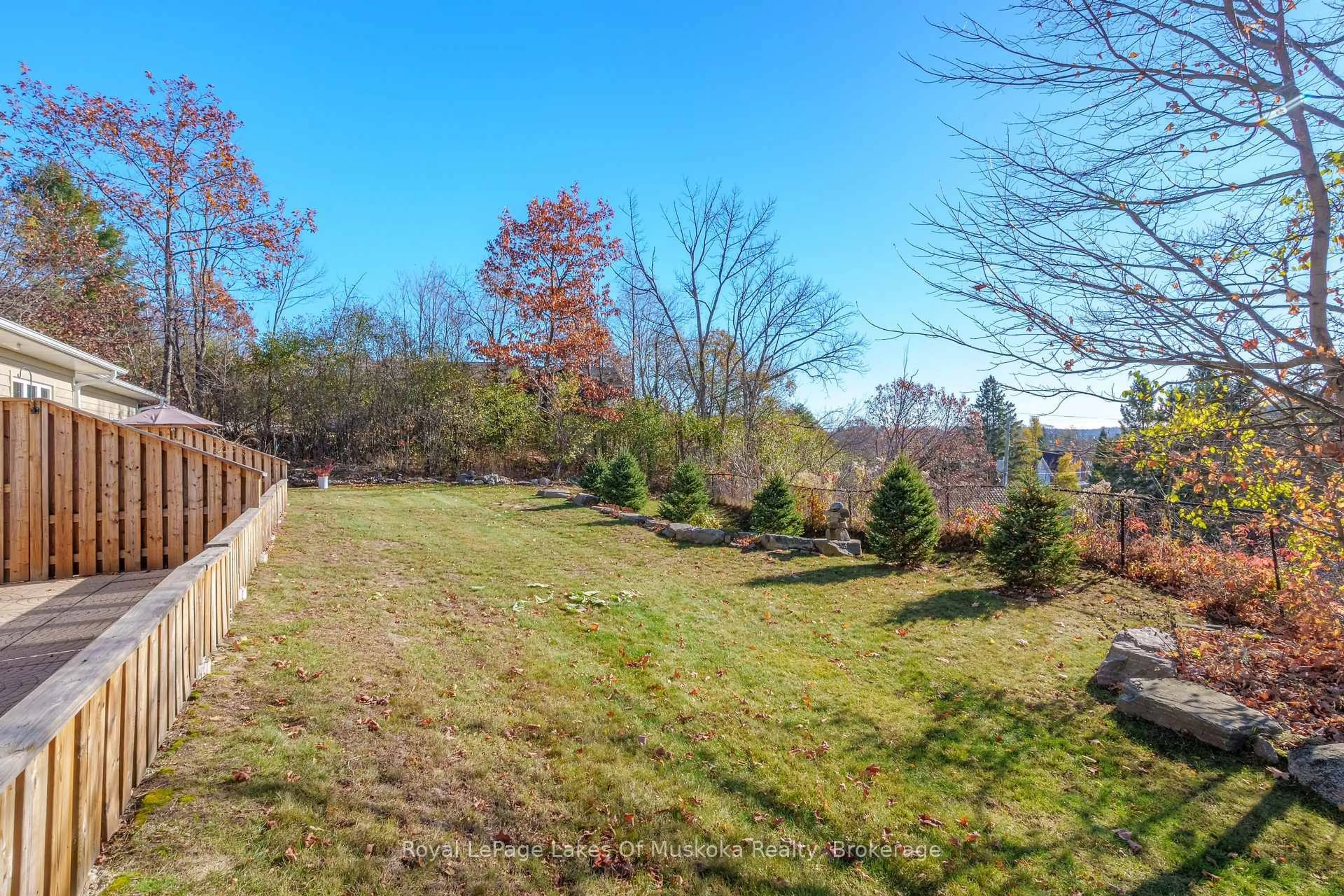 A pic from outside/outdoor area/front of a property/back of a property/a pic from drone, forest/trees view for 5 Jordan Lane #8, Huntsville Ontario P1H 1K9