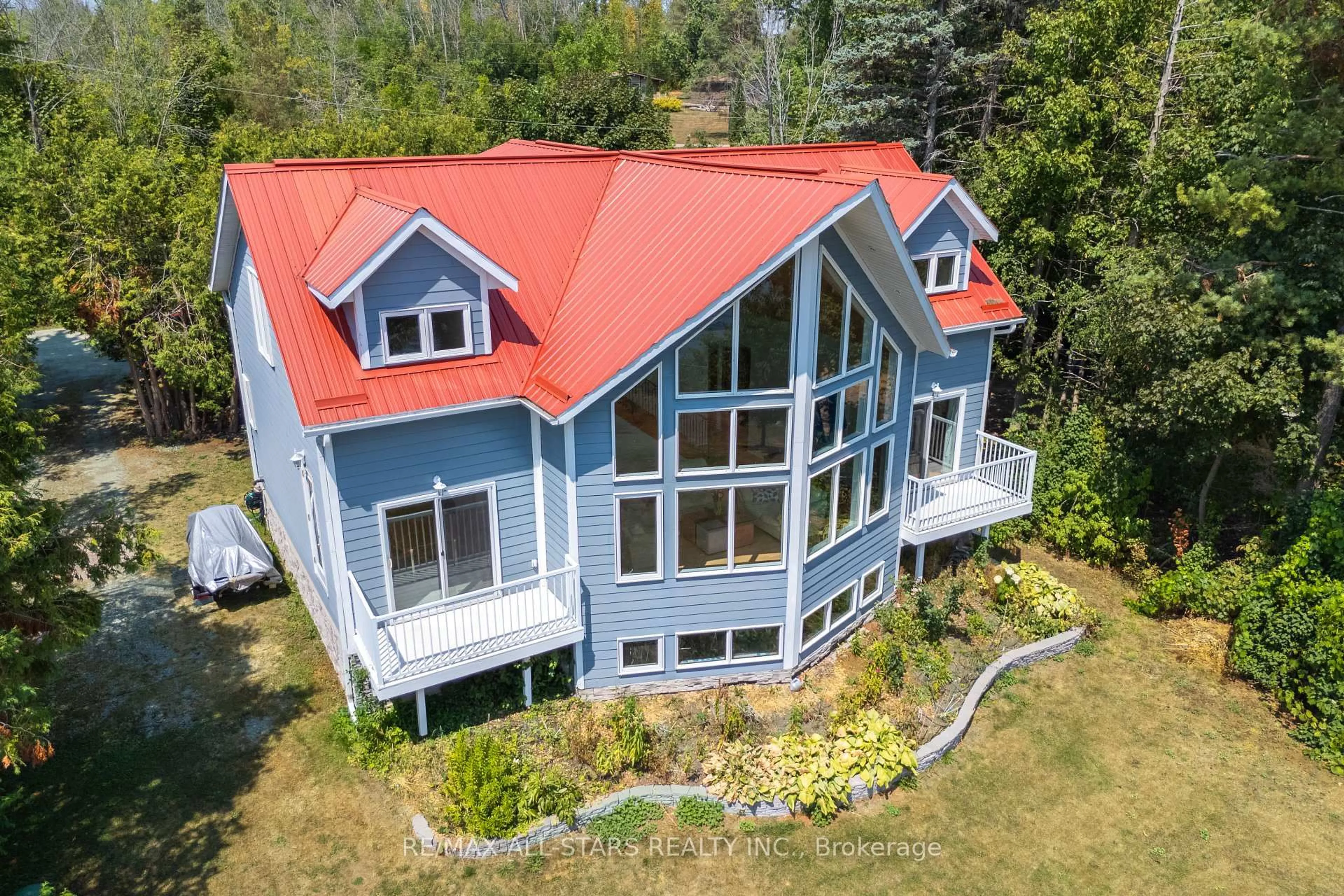 A pic from outside/outdoor area/front of a property/back of a property/a pic from drone, water/lake/river/ocean view for 9 Briar St, Kawartha Lakes Ontario K0M 1G0