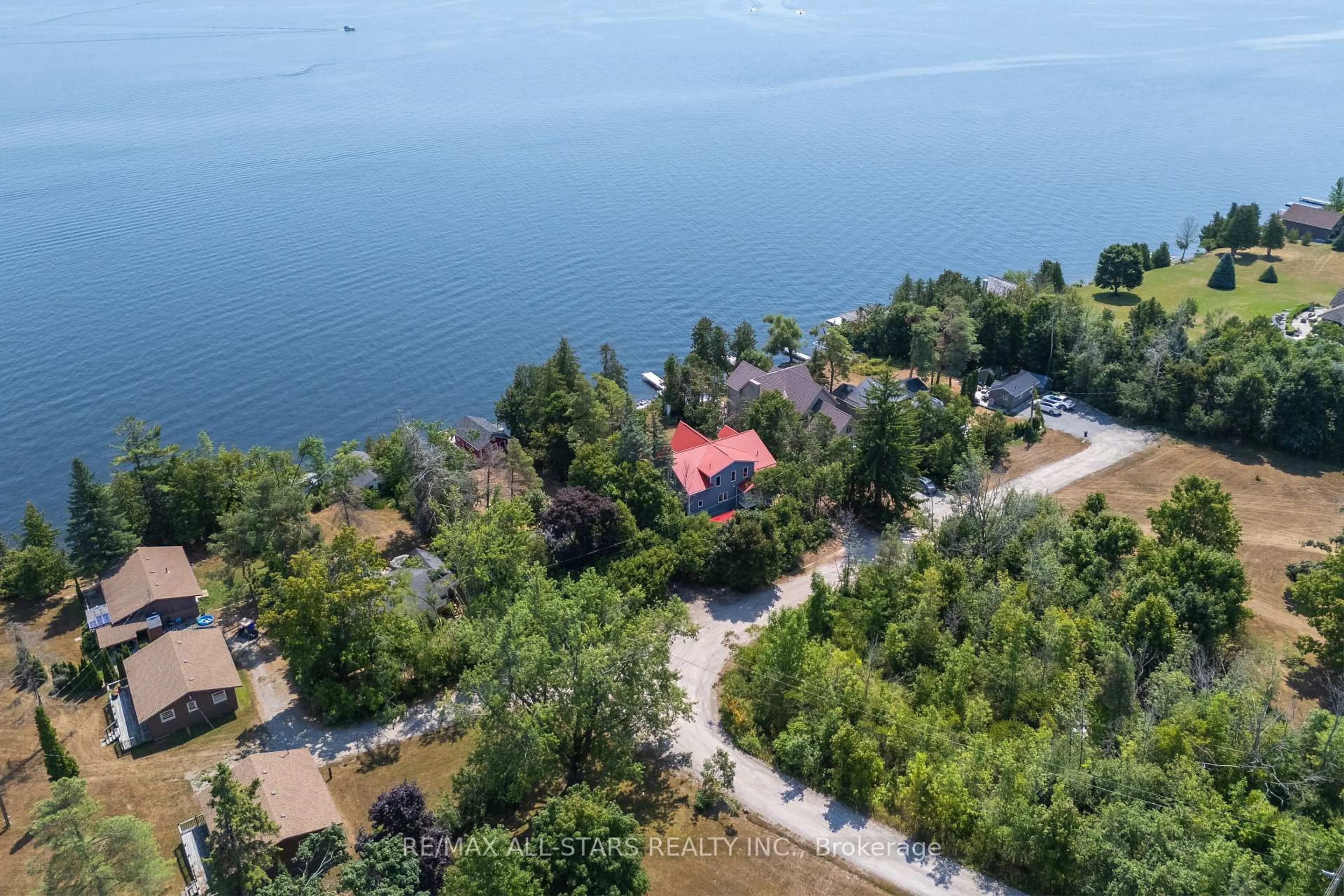 A pic from outside/outdoor area/front of a property/back of a property/a pic from drone, water/lake/river/ocean view for 9 Briar St, Kawartha Lakes Ontario K0M 1G0