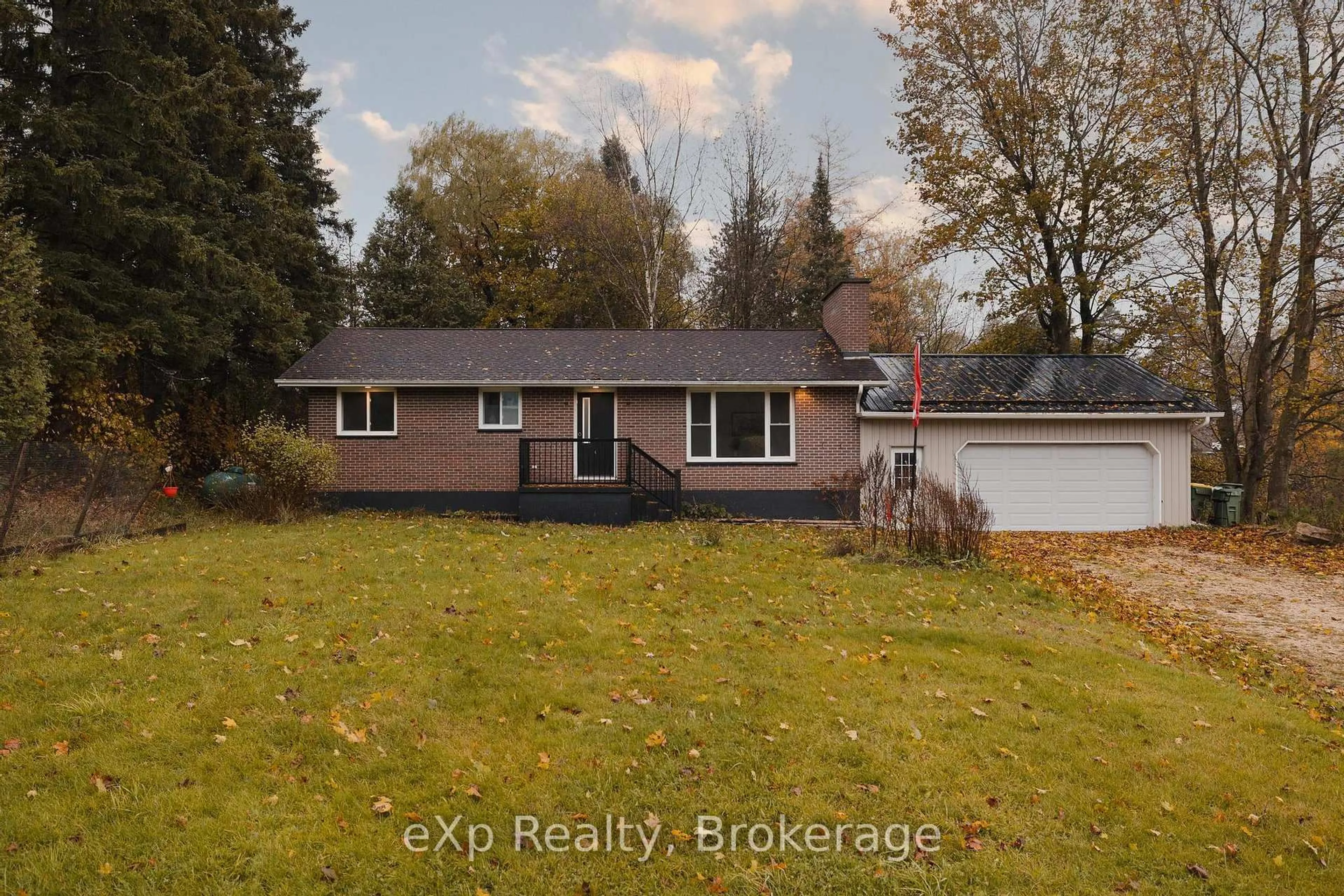 A pic from outside/outdoor area/front of a property/back of a property/a pic from drone, water/lake/river/ocean view for 405014 Grey 4 Rd, Grey Highlands Ontario N0C 1E0