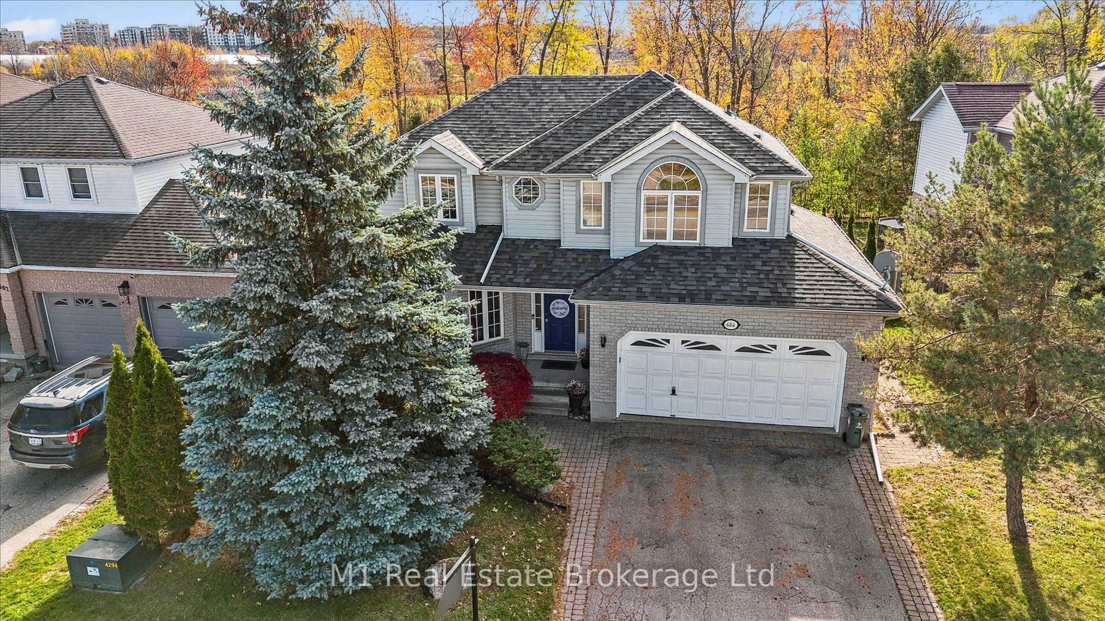 A pic from outside/outdoor area/front of a property/back of a property/a pic from drone, street for 684 Willow Rd, Guelph Ontario N1H 1K2