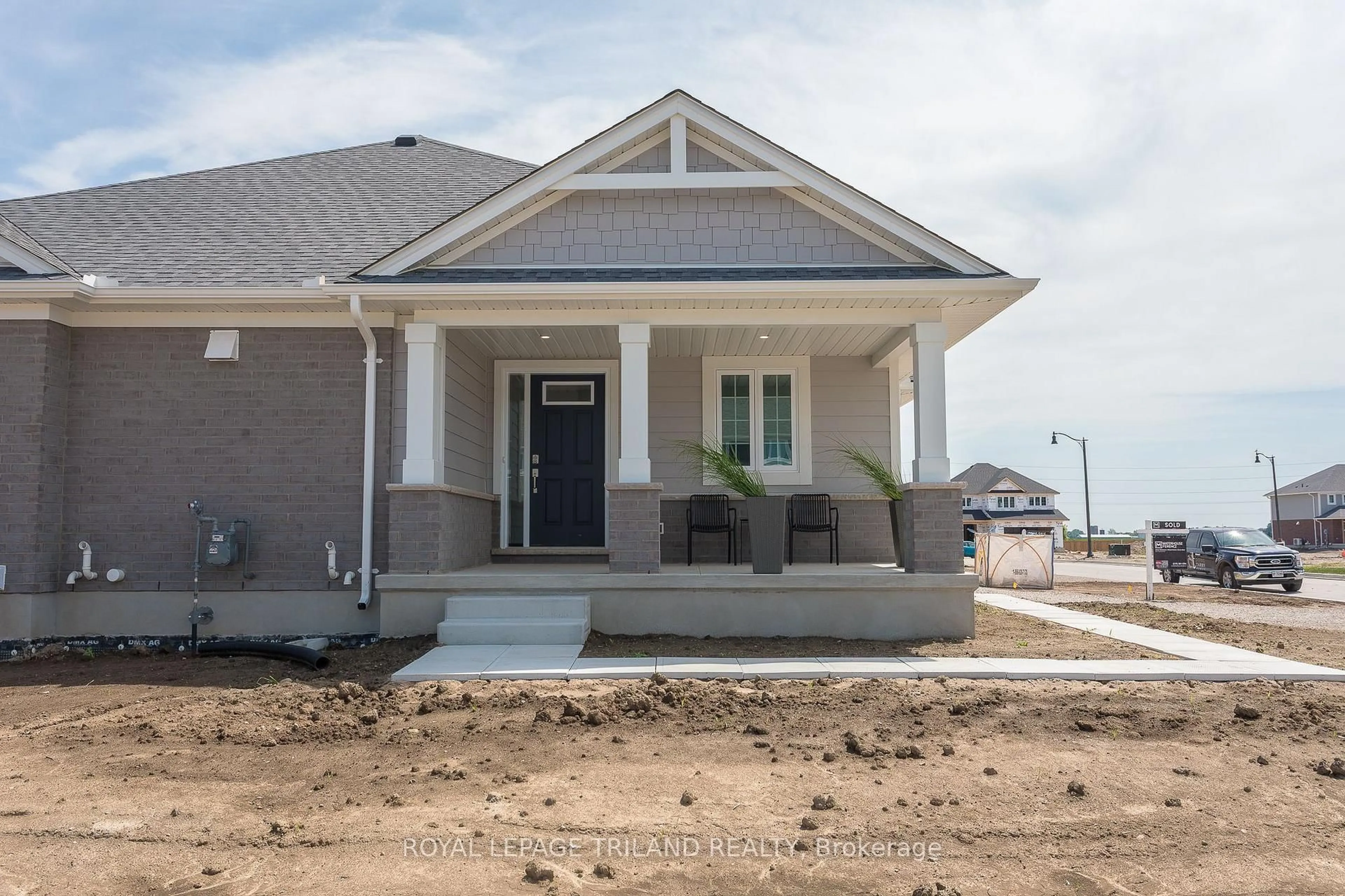 Home with vinyl exterior material, street for 1 Harrow Lane, St. Thomas Ontario N5R 0P3