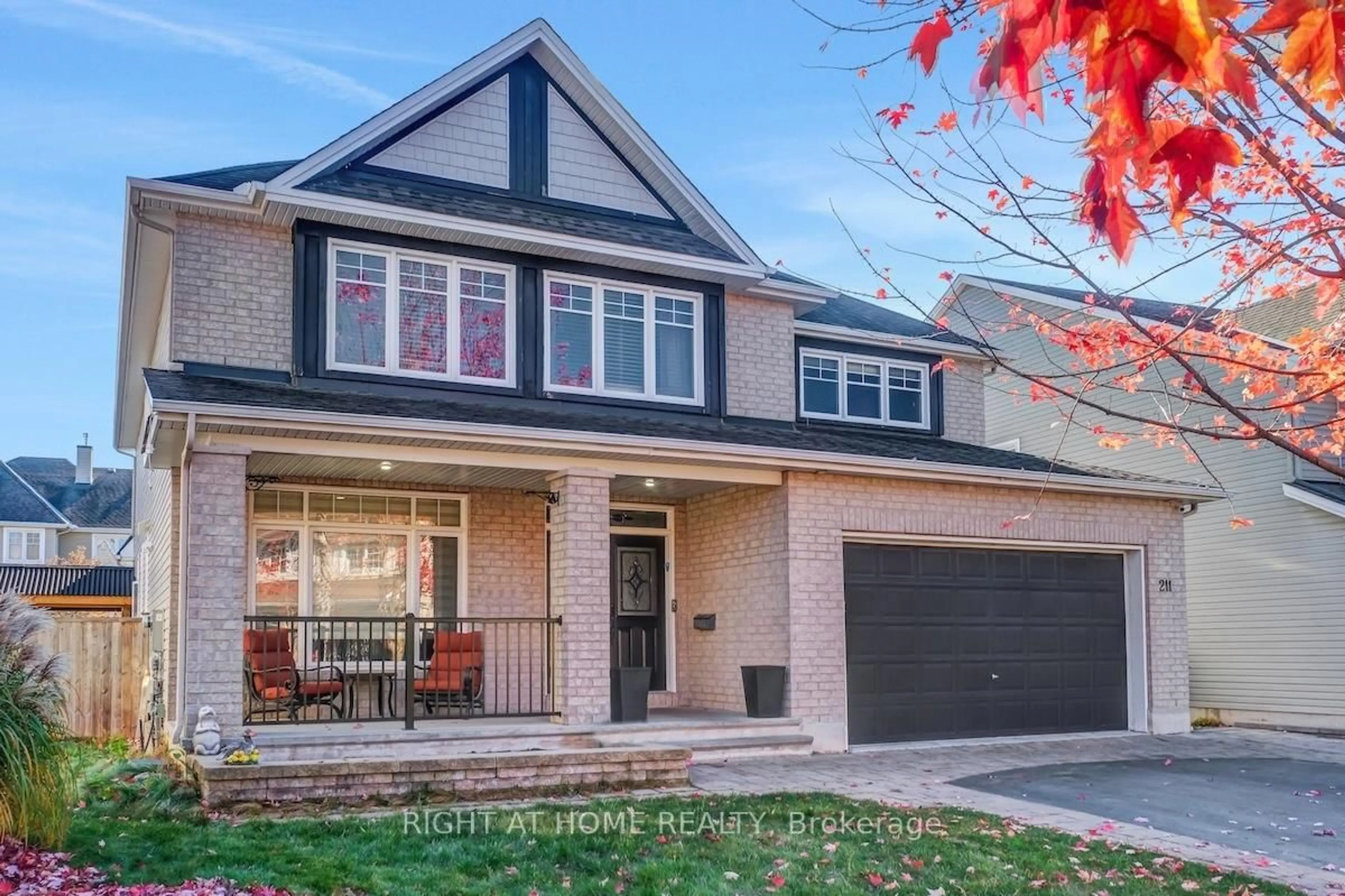 Home with brick exterior material, street for 211 Denali Way, Stittsville Ontario K2S 0N1