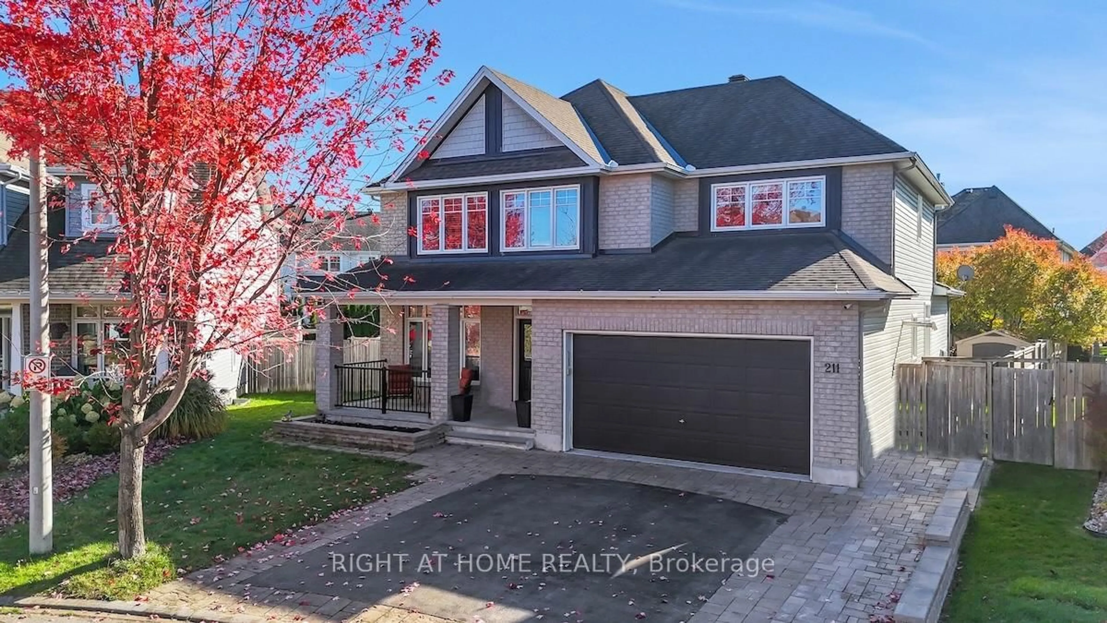 Home with brick exterior material, street for 211 Denali Way, Stittsville Ontario K2S 0N1