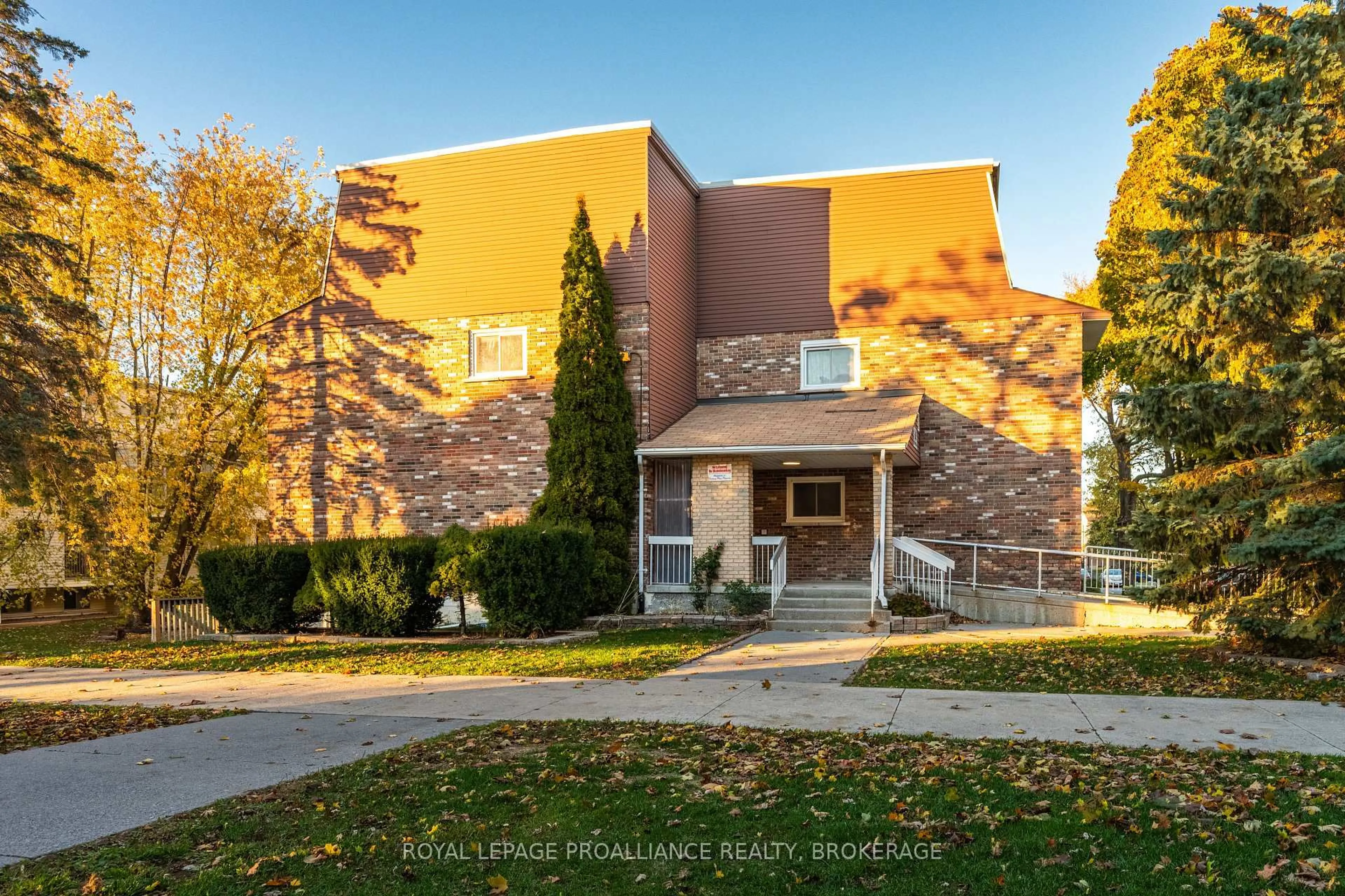 Home with brick exterior material, street for 845 Milford Dr #203, Kingston Ontario K7P 1A7