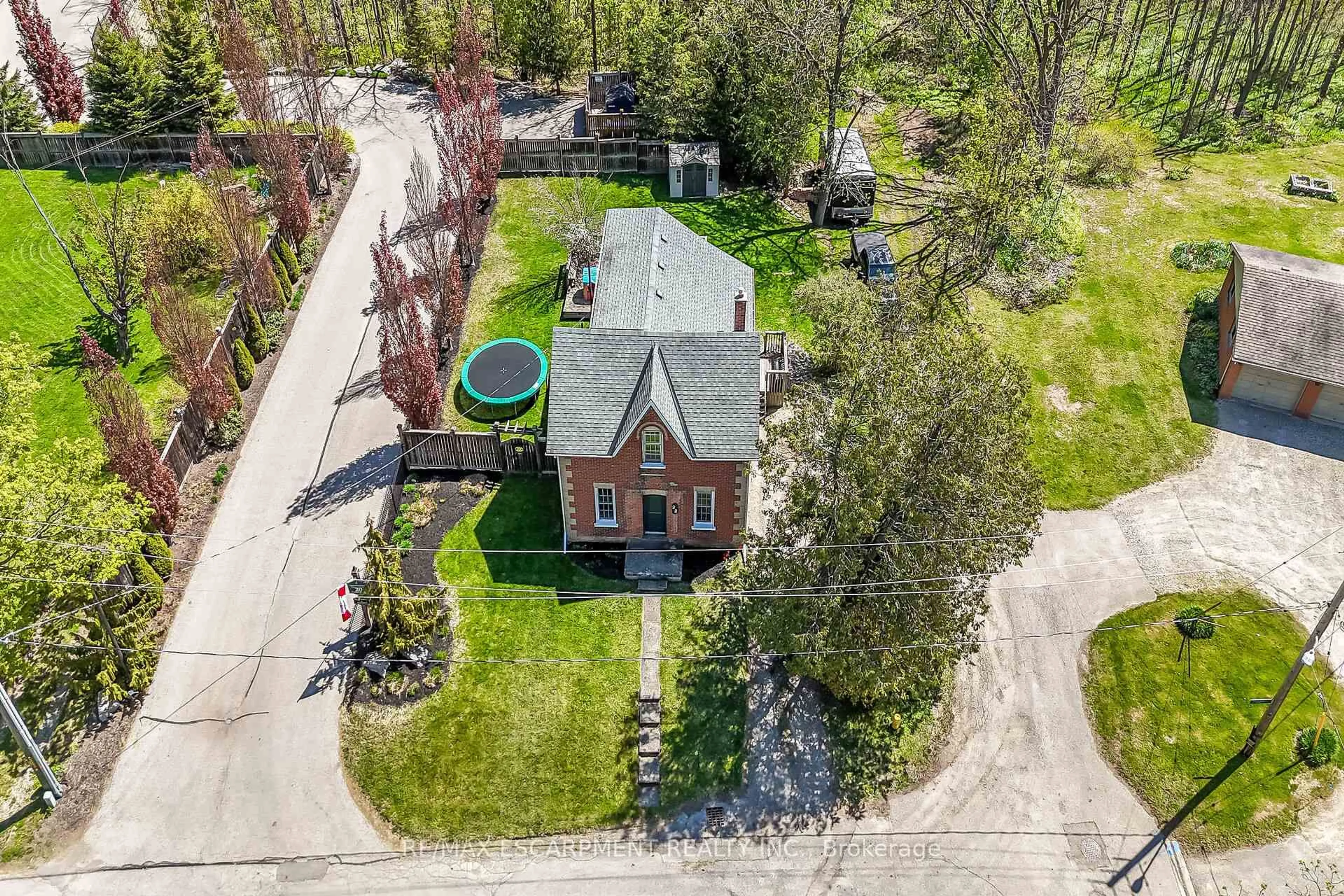 A pic from outside/outdoor area/front of a property/back of a property/a pic from drone, street for 22 Tolhurst Ave, Brant Ontario N0E 1N0