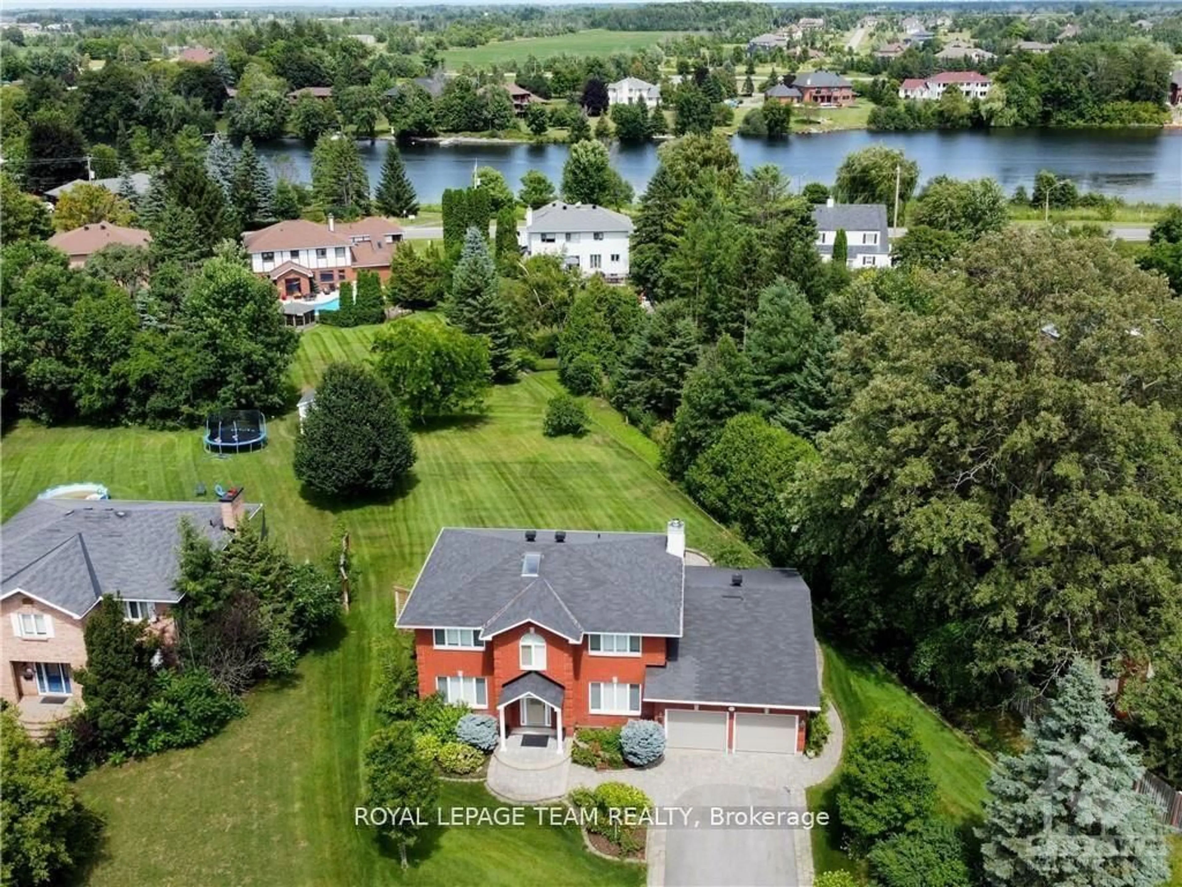 A pic from outside/outdoor area/front of a property/back of a property/a pic from drone, water/lake/river/ocean view for 1105 CINDY HILL Cres, Ottawa Ontario K4M 1E8