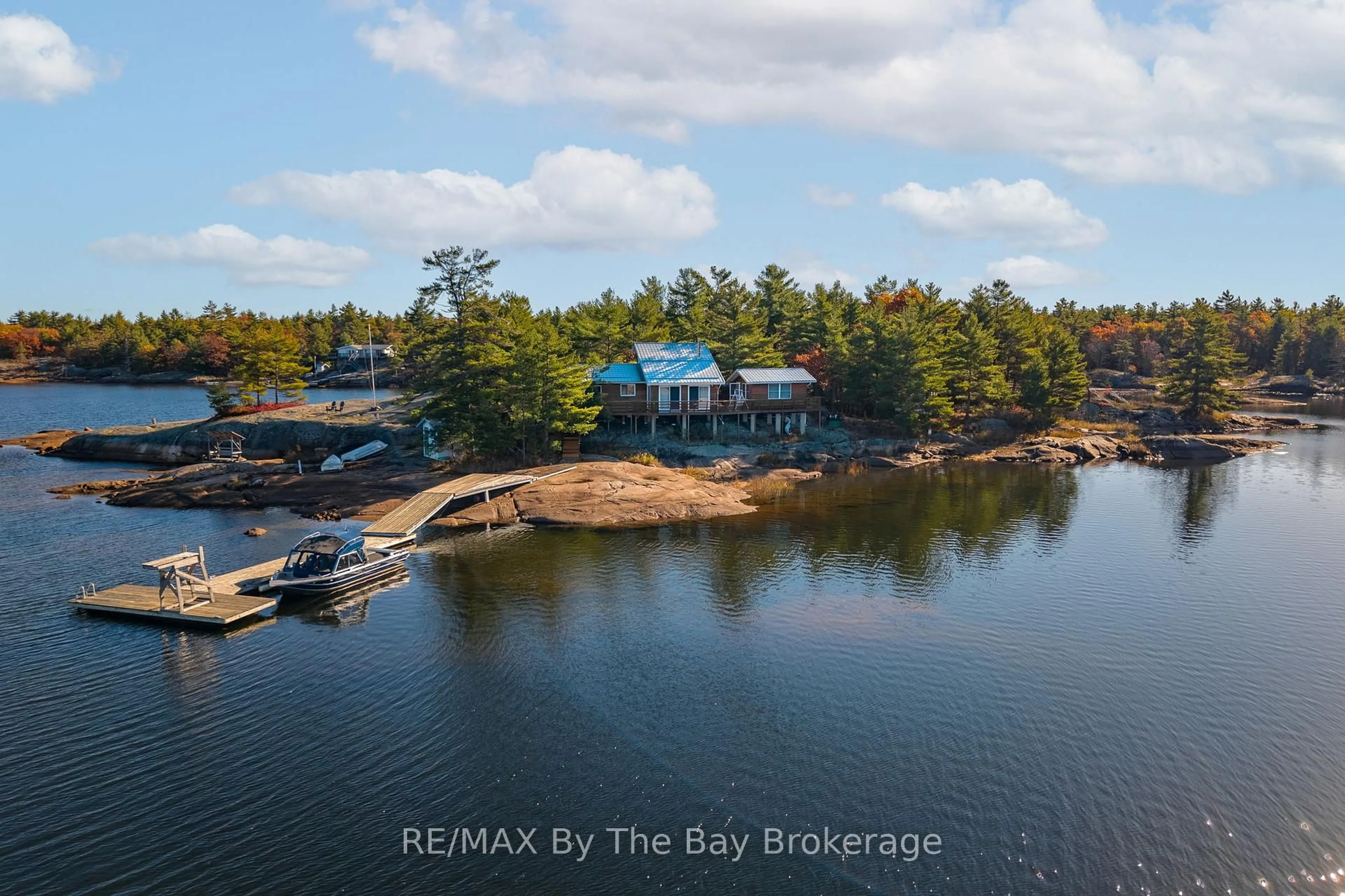 A pic from outside/outdoor area/front of a property/back of a property/a pic from drone, water/lake/river/ocean view for 2 Island 2890, Georgian Bay Ontario P0E 1E0