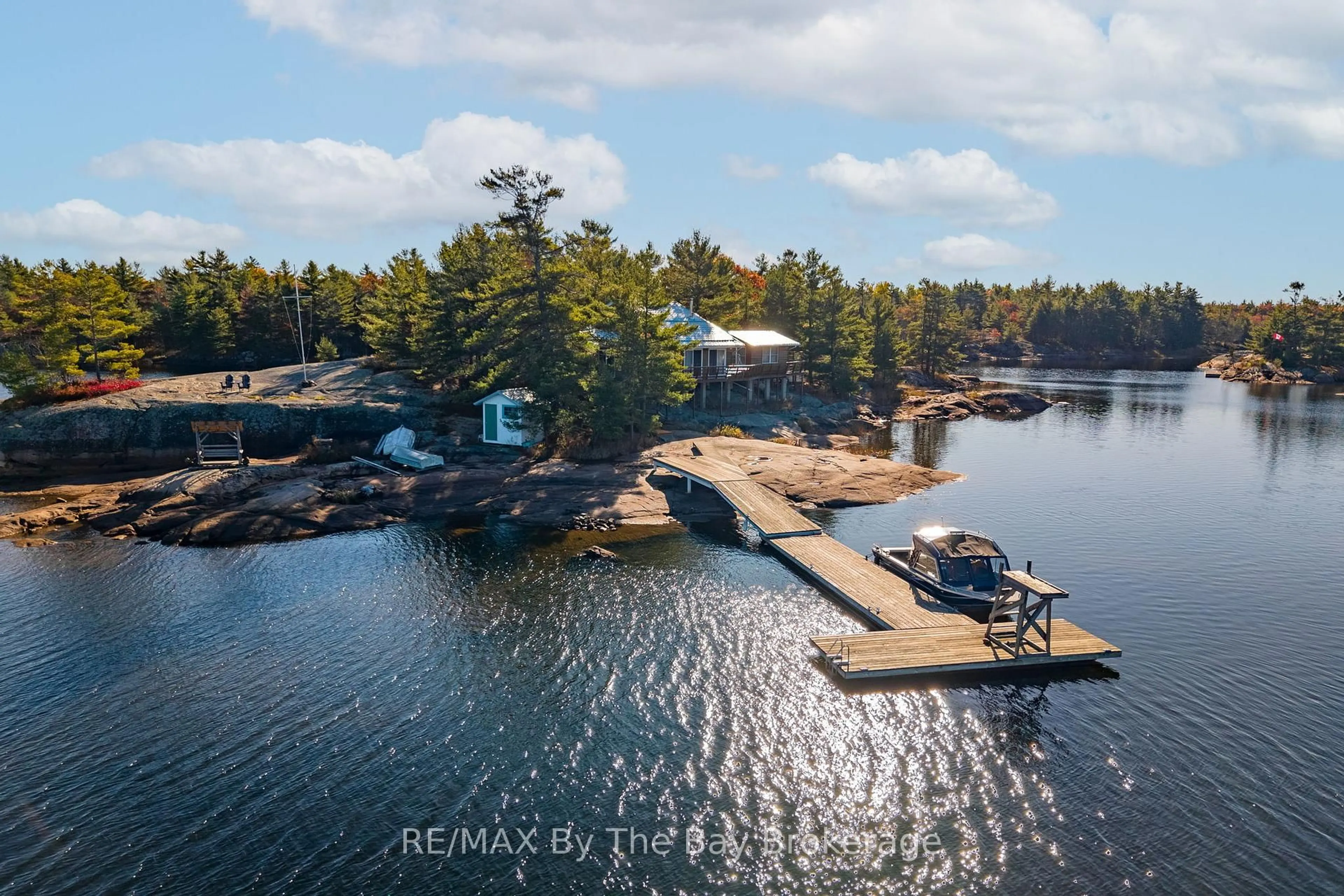 A pic from outside/outdoor area/front of a property/back of a property/a pic from drone, water/lake/river/ocean view for 2 Island 2890, Georgian Bay Ontario P0E 1E0