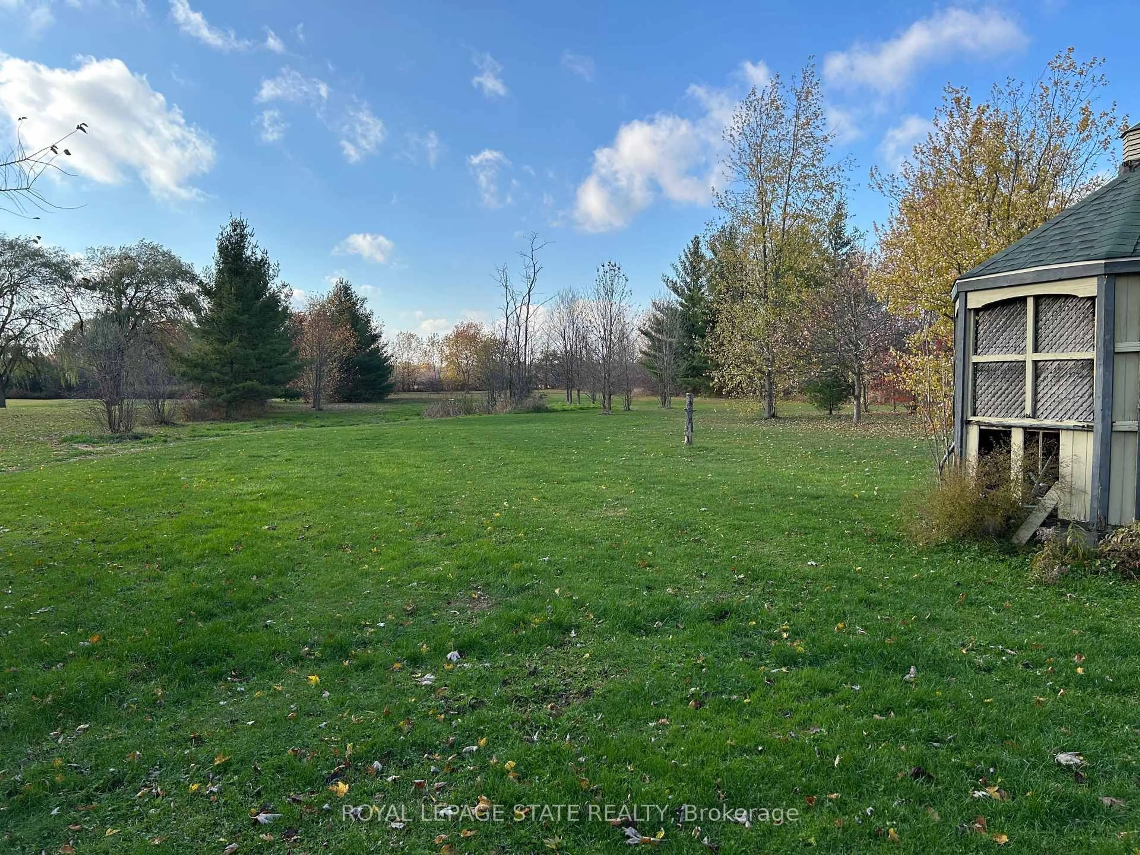 A pic from outside/outdoor area/front of a property/back of a property/a pic from drone, forest/trees view for 7760 3 Highway, Haldimand Ontario N1A 2W4