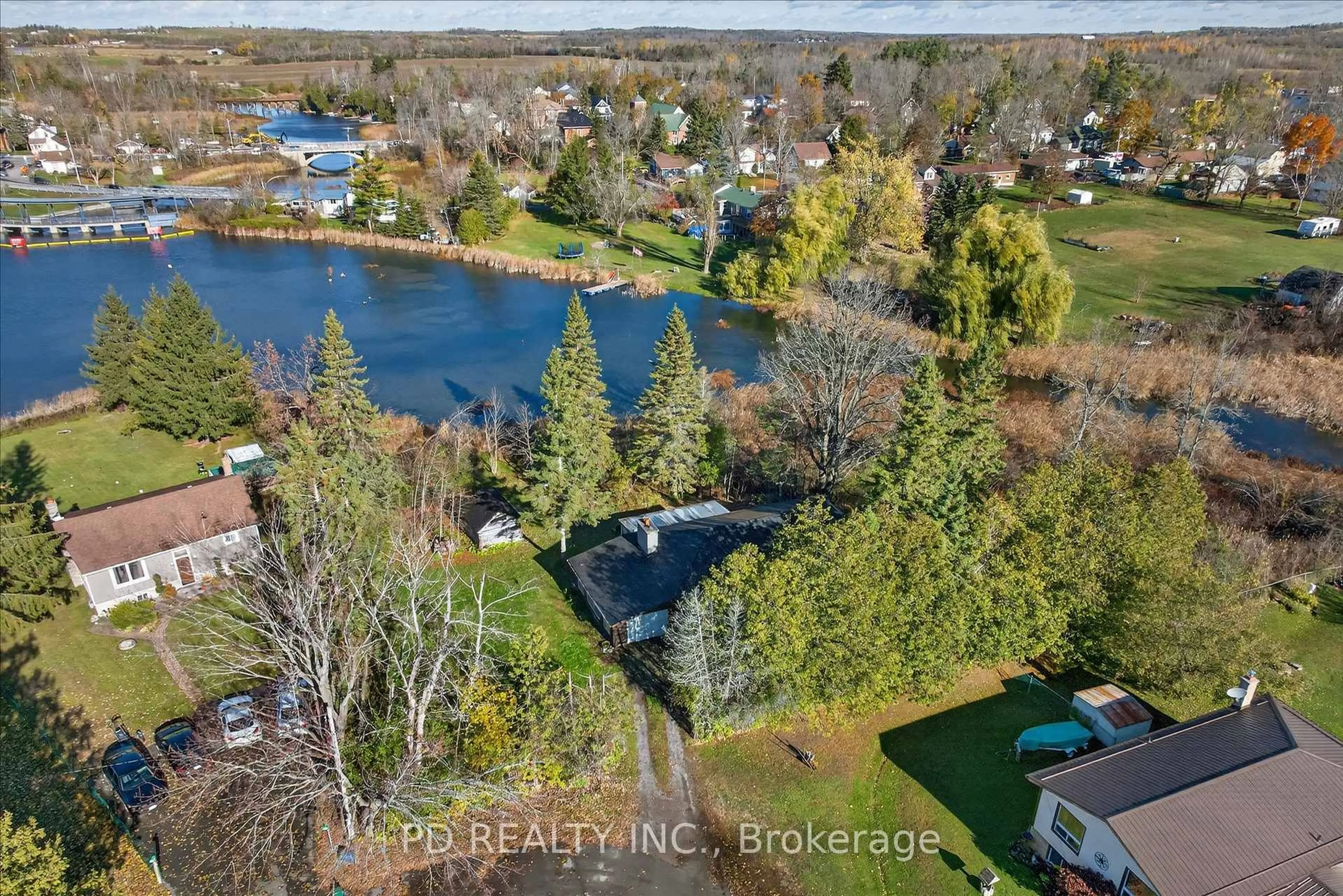 A pic from outside/outdoor area/front of a property/back of a property/a pic from drone, water/lake/river/ocean view for 54 Carlton Cres, Kawartha Lakes Ontario K0L 2W0