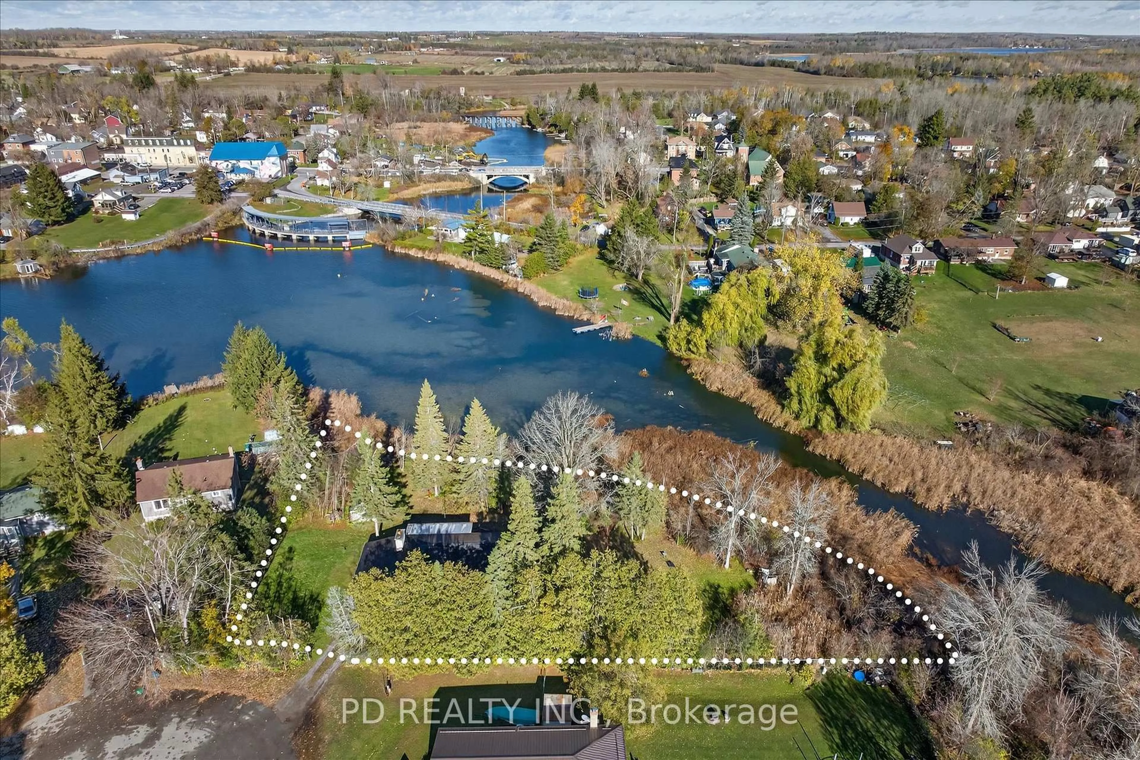 A pic from outside/outdoor area/front of a property/back of a property/a pic from drone, water/lake/river/ocean view for 54 Carlton Cres, Kawartha Lakes Ontario K0L 2W0