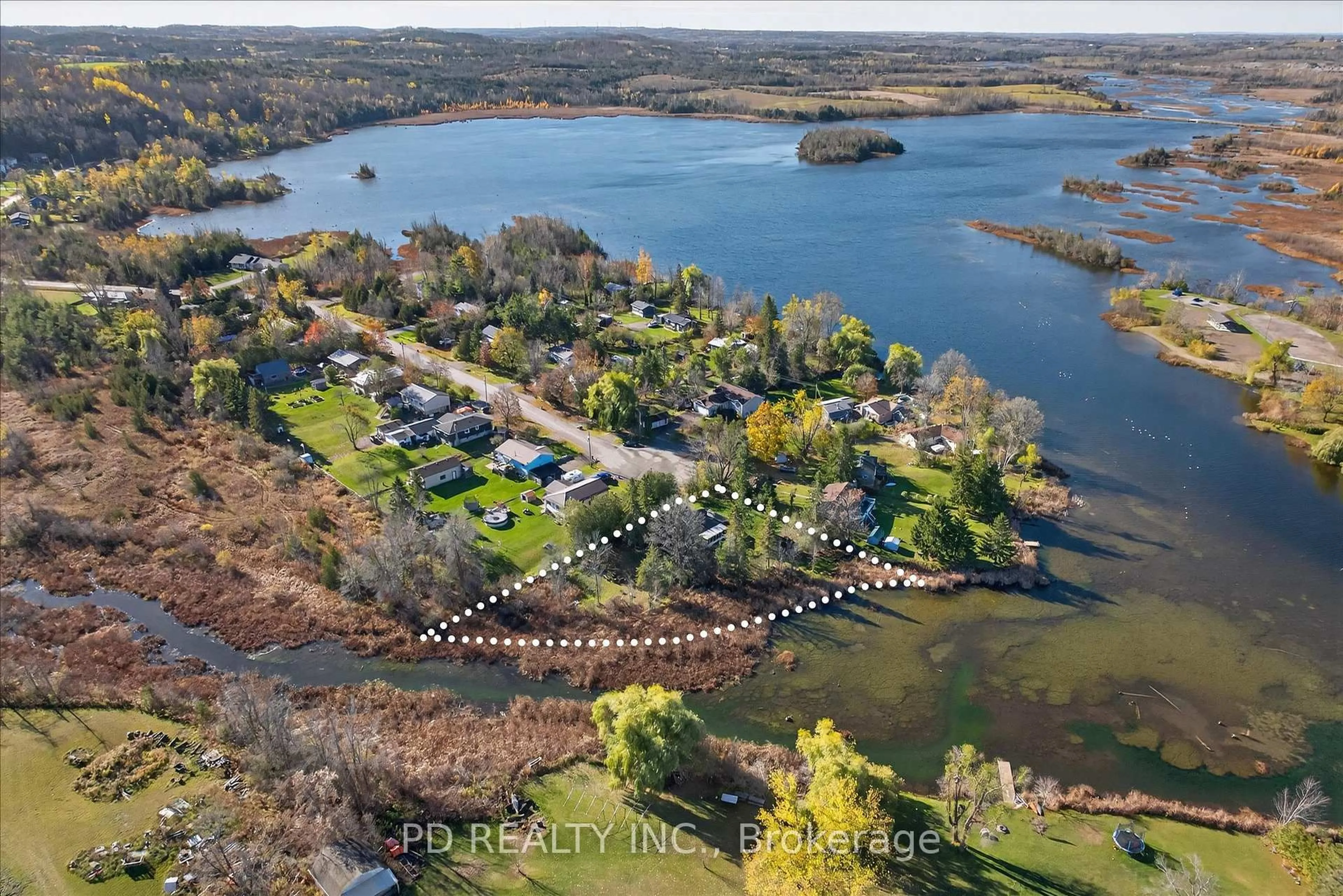 A pic from outside/outdoor area/front of a property/back of a property/a pic from drone, water/lake/river/ocean view for 54 Carlton Cres, Kawartha Lakes Ontario K0L 2W0
