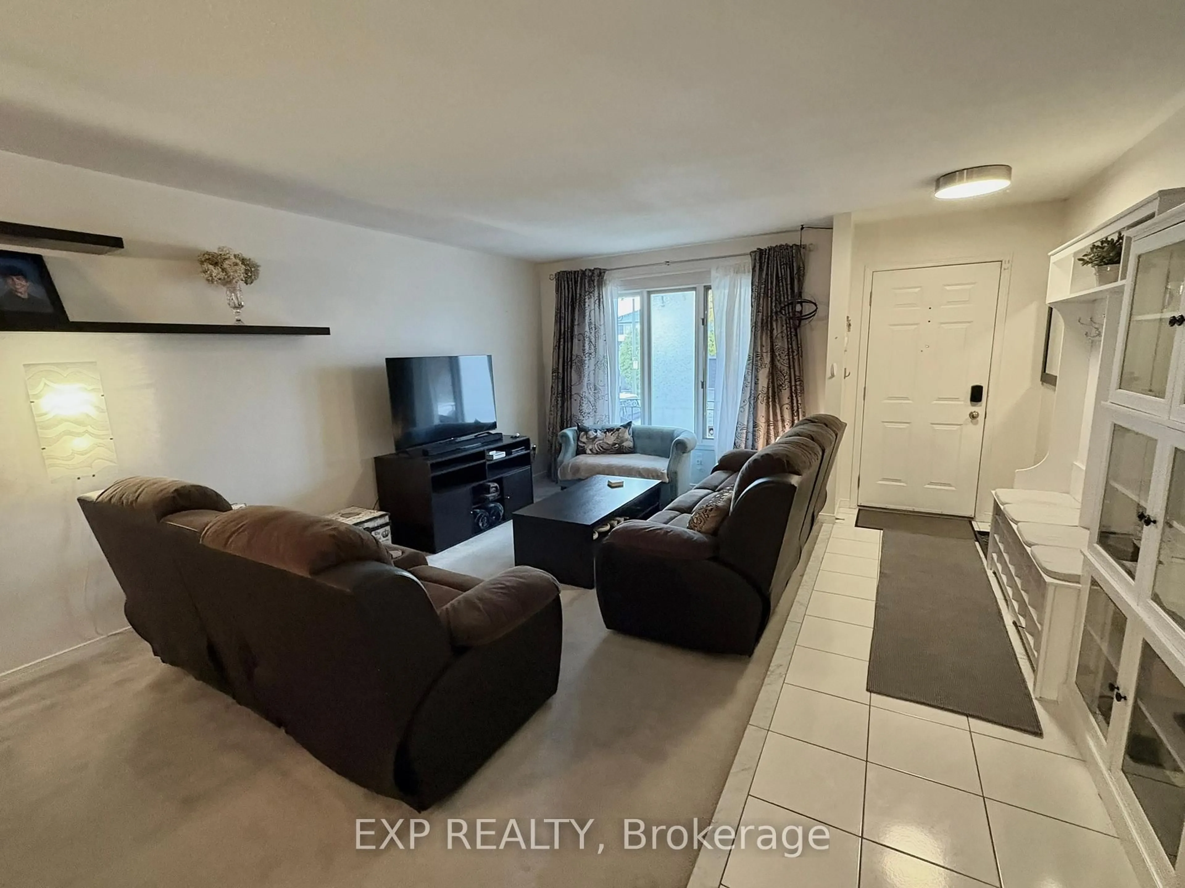 Living room with furniture, unknown for 332 Acadia Dr, Hamilton Ontario L8W 3L7