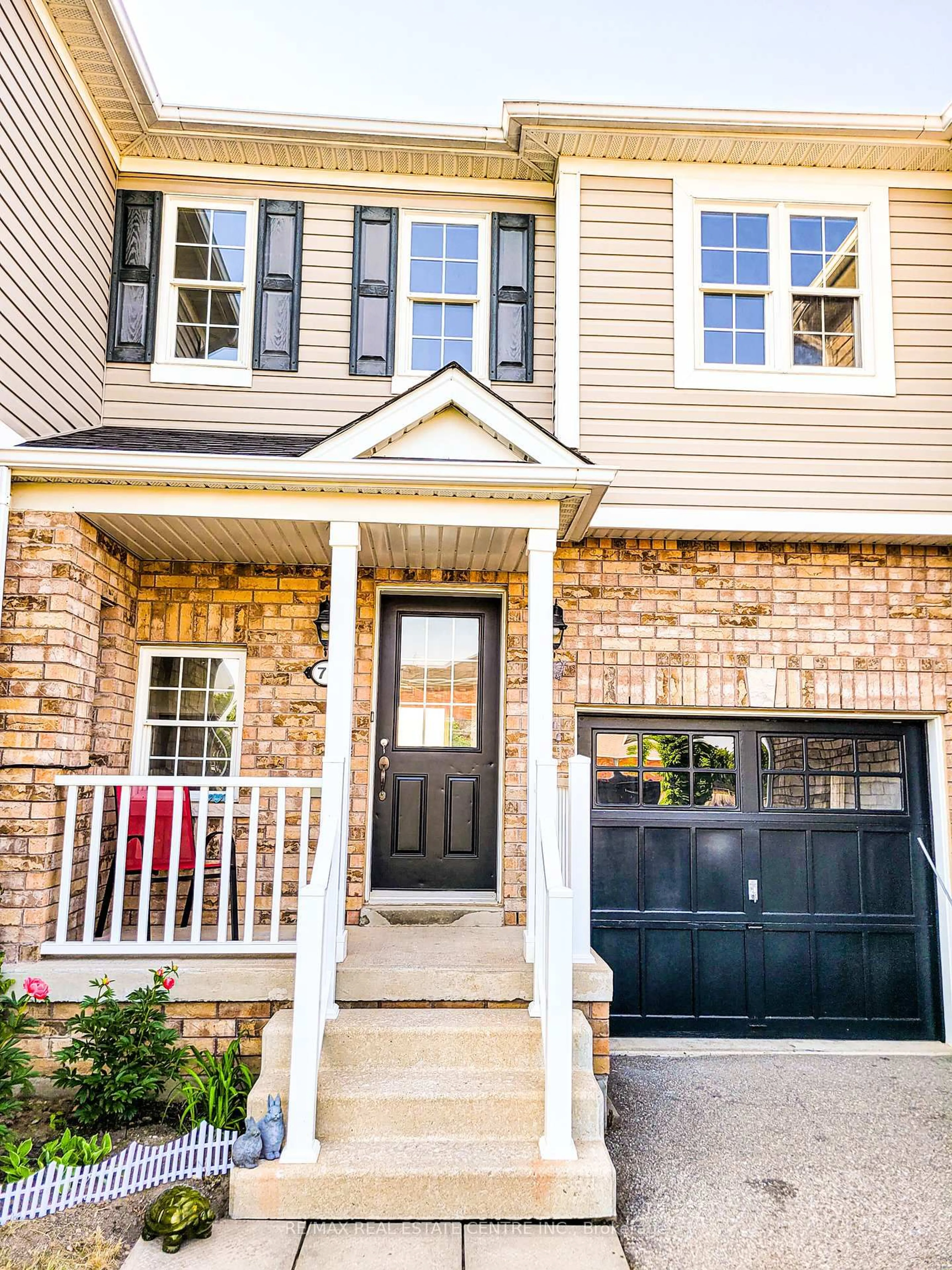 Home with brick exterior material, street for 71 Bloomington Dr, Cambridge Ontario N1P 1J5