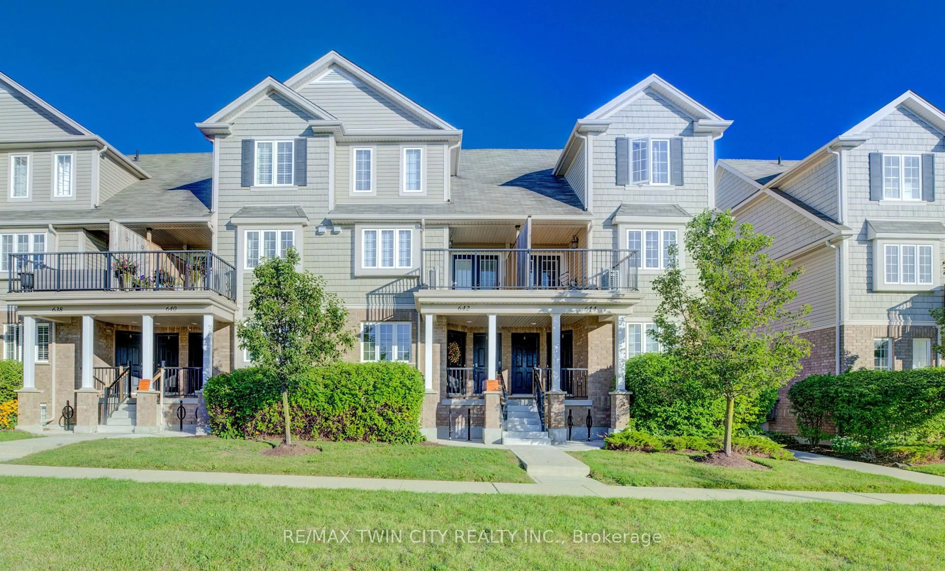 Home with brick exterior material, street for 642 Woodlawn Rd #642A, Guelph Ontario N1E 0K4