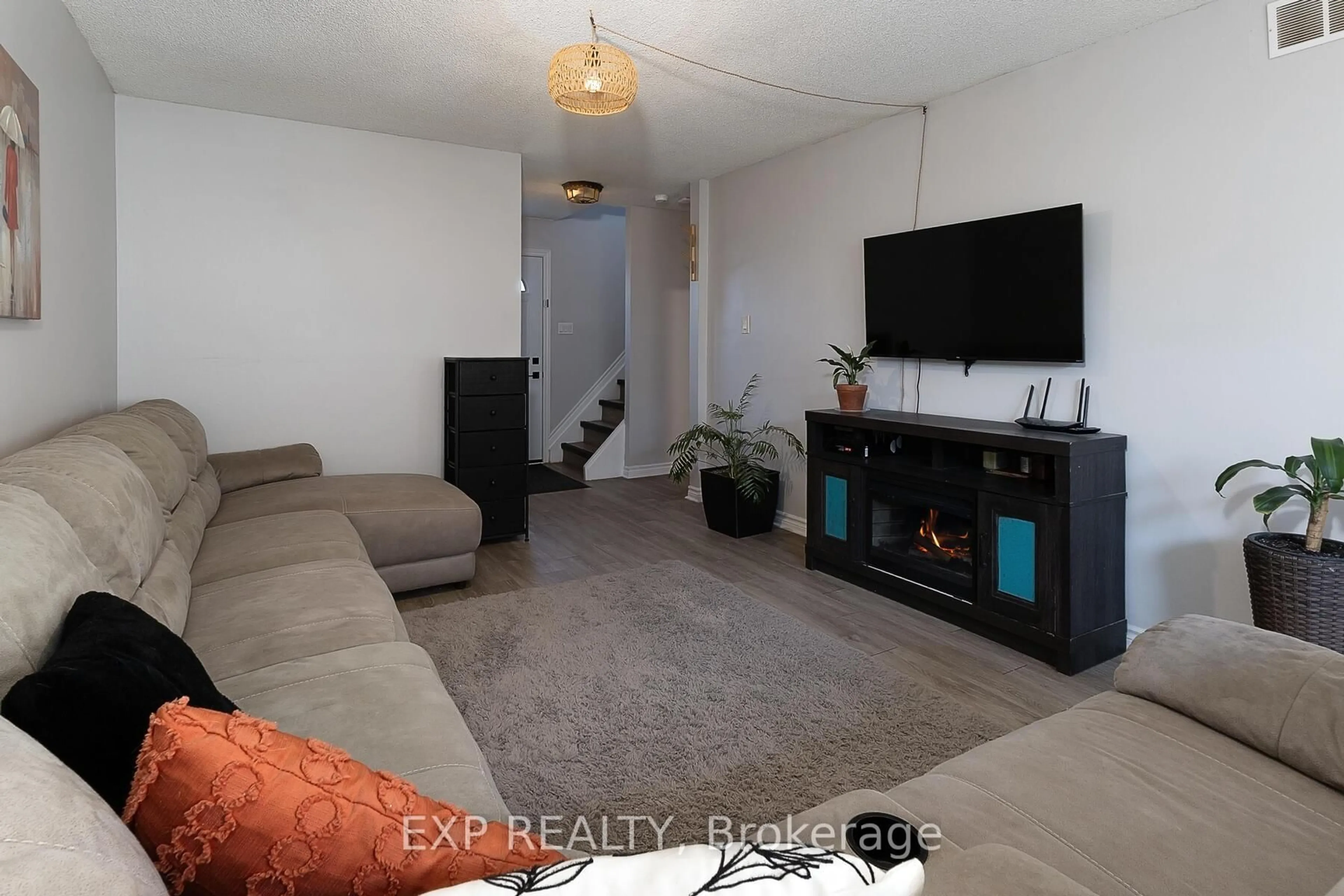 Living room with furniture, unknown for 881 Southdale Rd #0, London South Ontario N6E 1V7