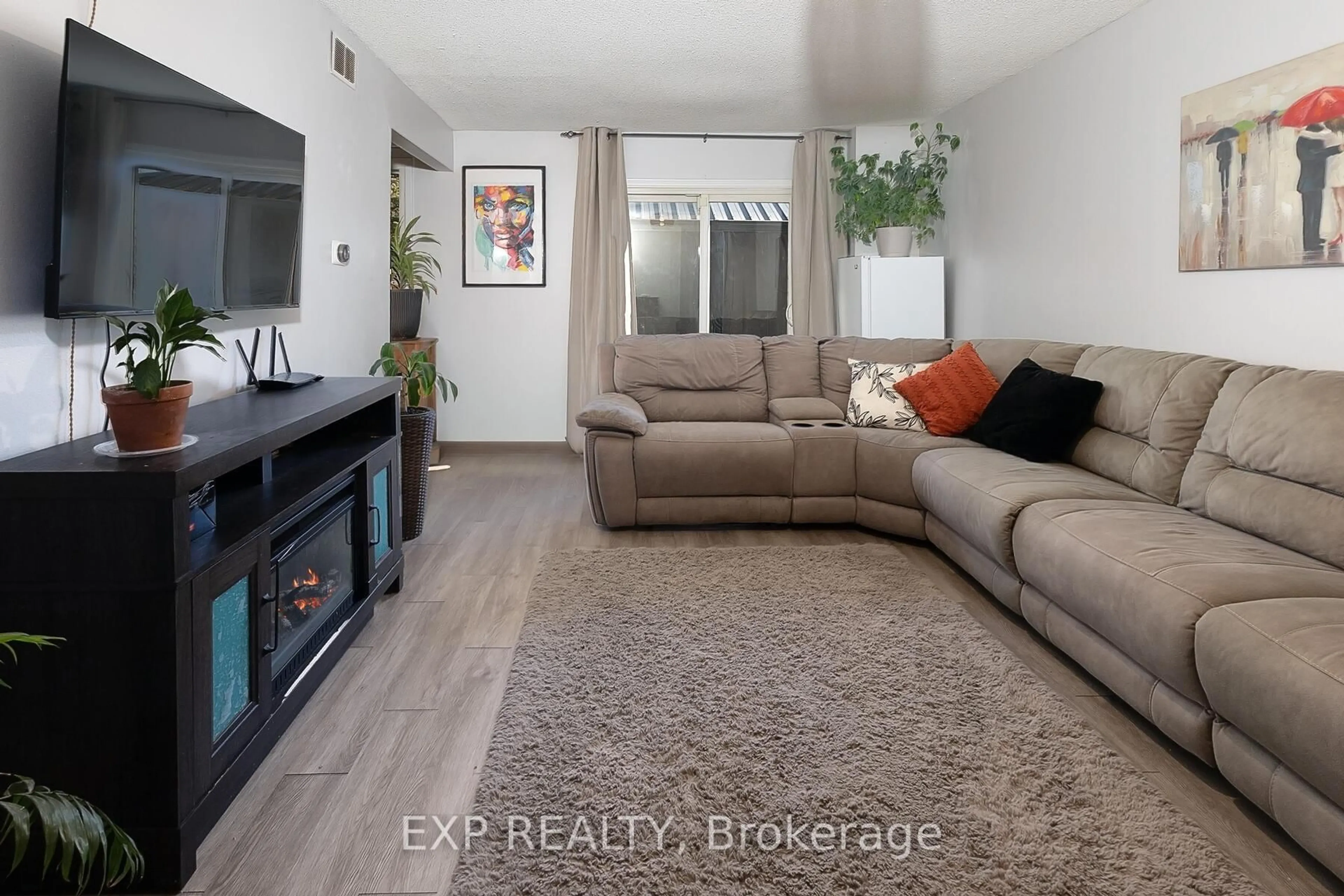 Living room with furniture, unknown for 881 Southdale Rd #0, London South Ontario N6E 1V7