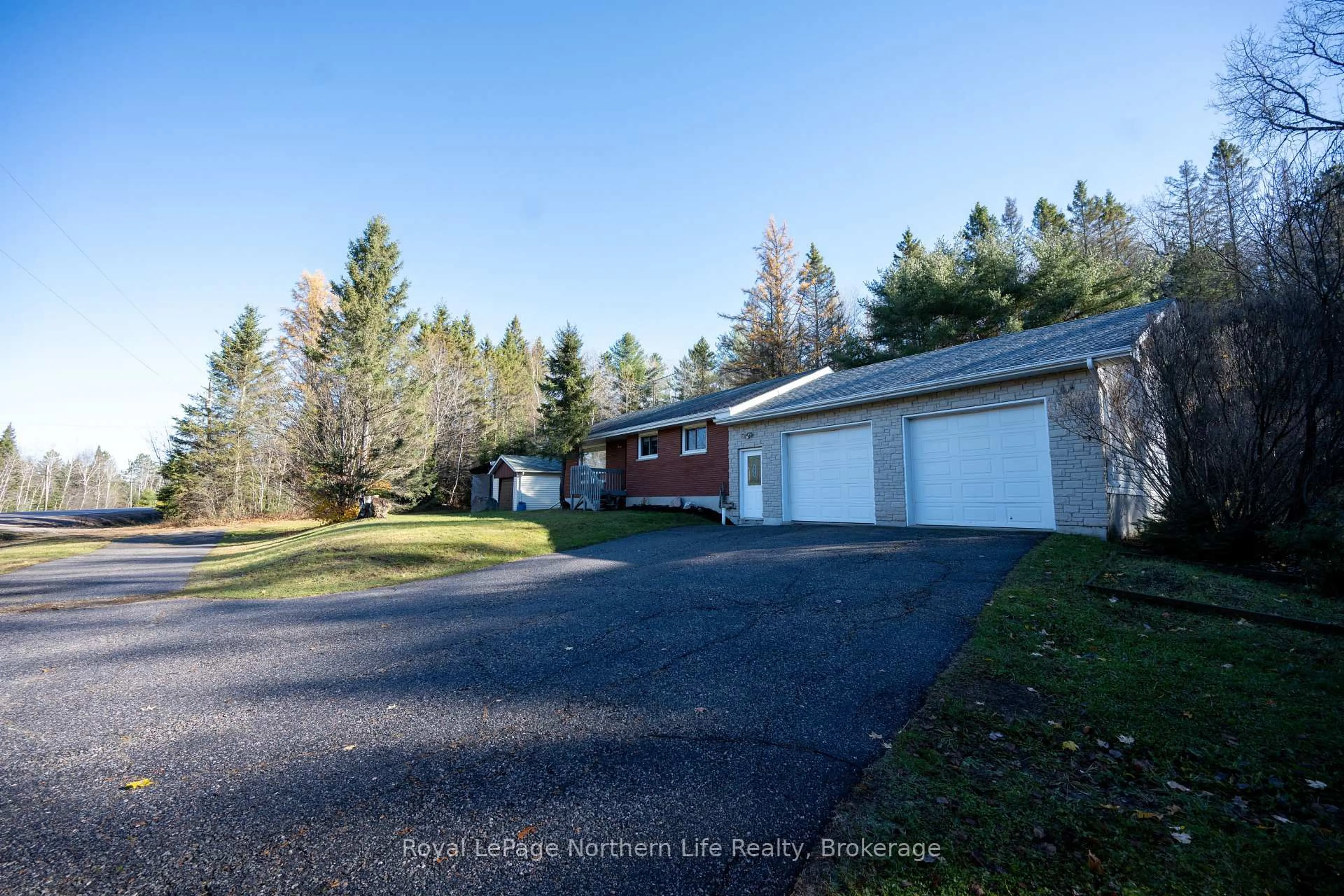 A pic from outside/outdoor area/front of a property/back of a property/a pic from drone, street for 126 Highway 531, Bonfield Ontario P0H 1E0