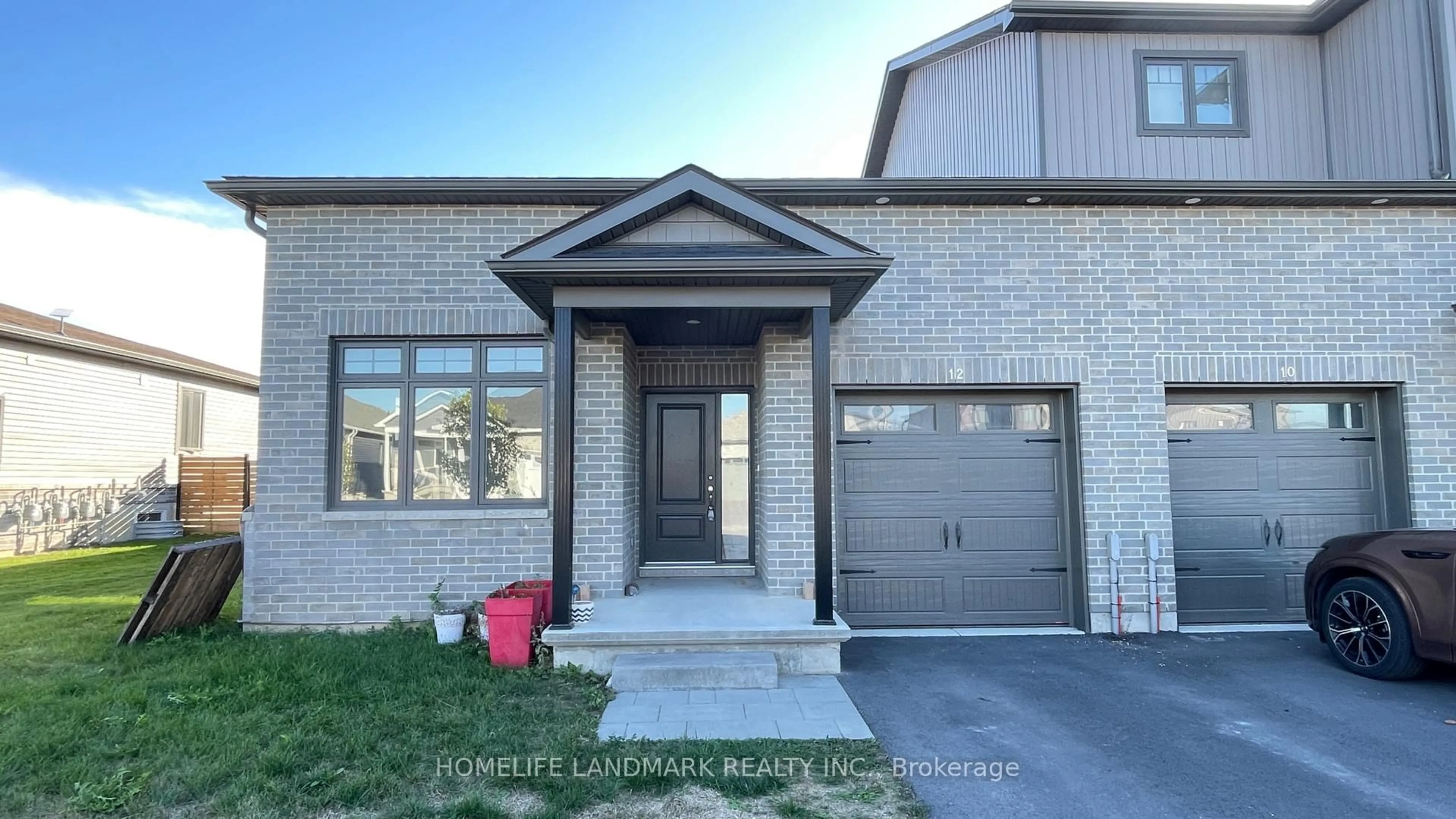 Home with brick exterior material, street for 12 Allen St, Prince Edward County Ontario K0K 2T0