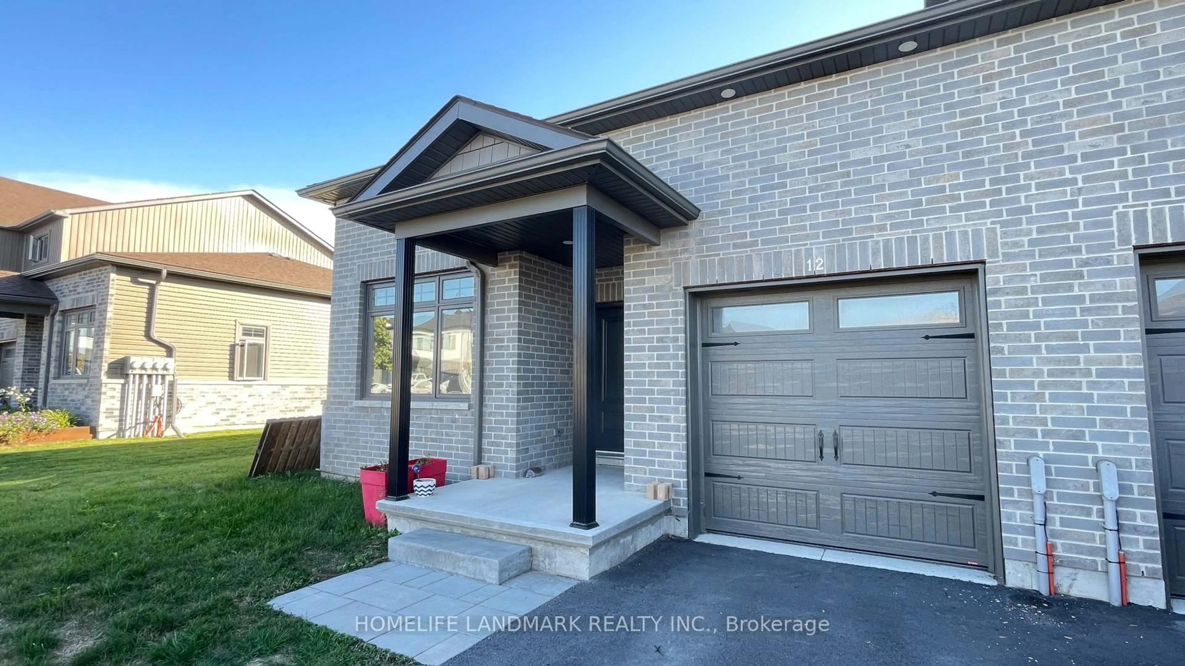 Home with brick exterior material, street for 12 Allen St, Prince Edward County Ontario K0K 2T0