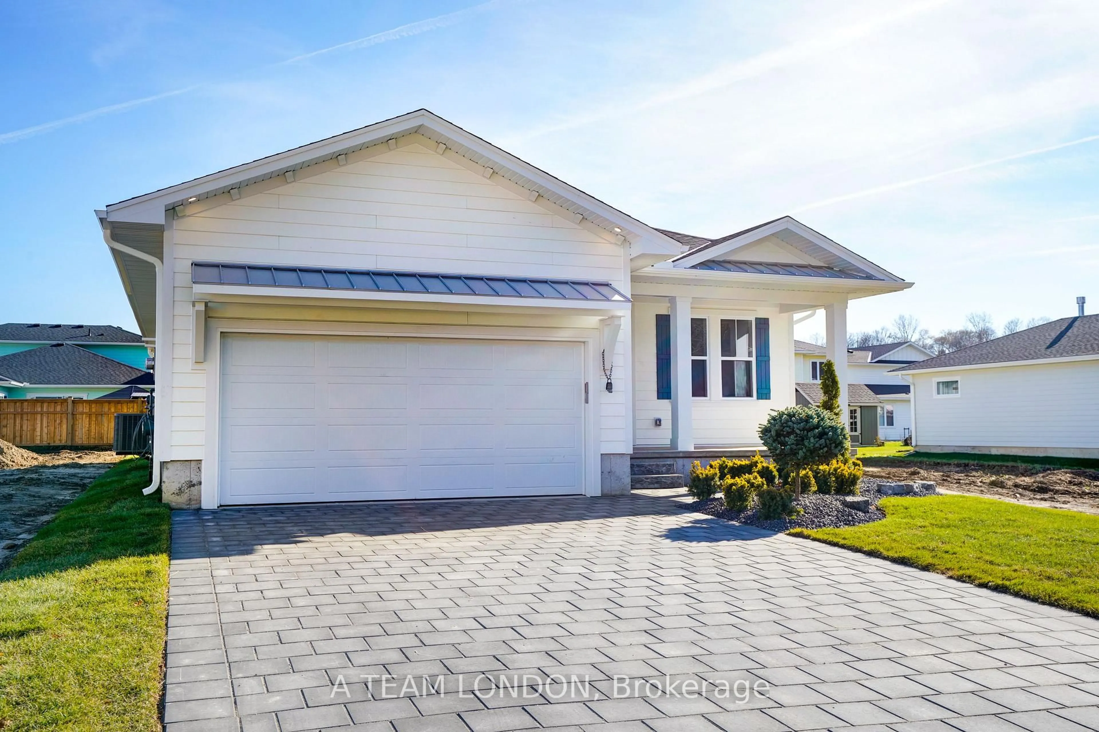 Home with vinyl exterior material, street for 91 The Promenade, Central Elgin Ontario N5L 1C5