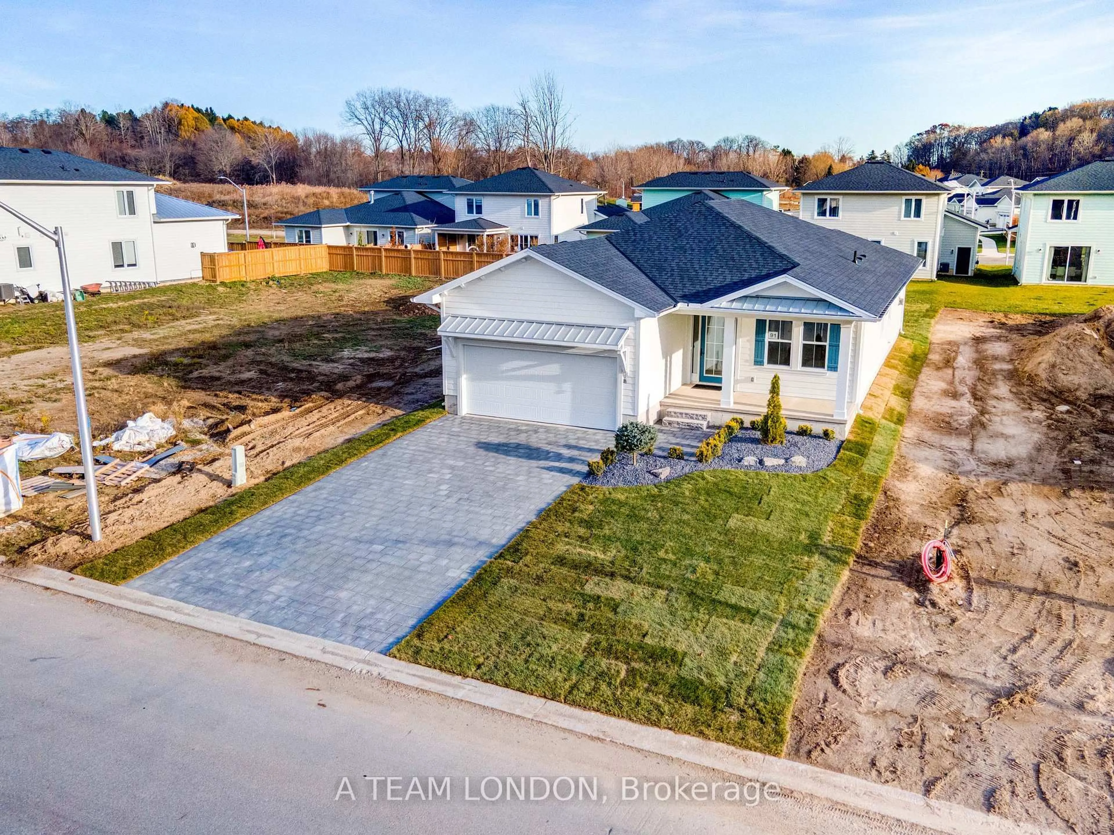 A pic from outside/outdoor area/front of a property/back of a property/a pic from drone, street for 91 The Promenade, Central Elgin Ontario N5L 1C5