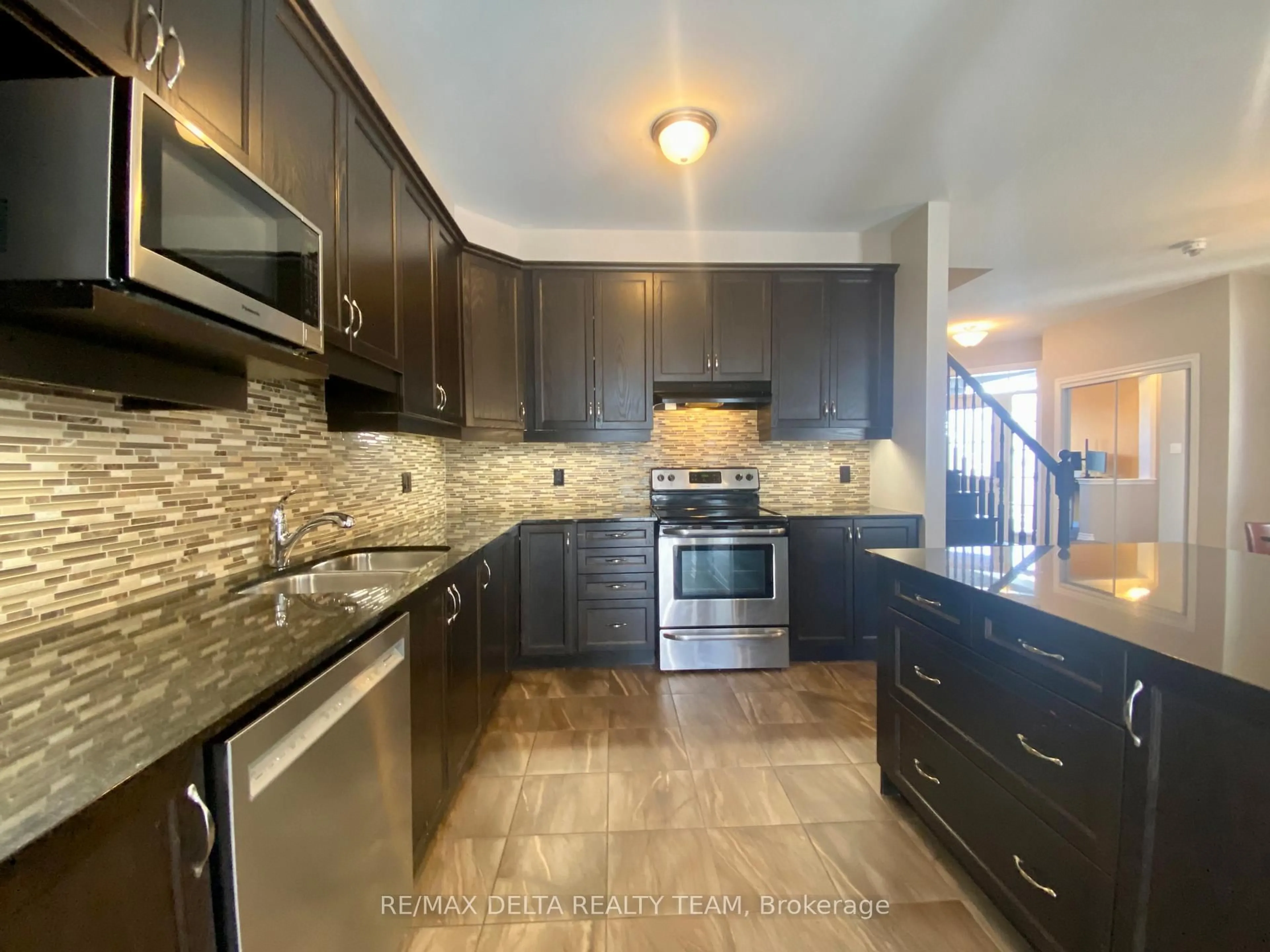 Open concept kitchen, ceramic/tile floor for 66 Escallonia Crt, Ottawa Ontario K2S 0W9