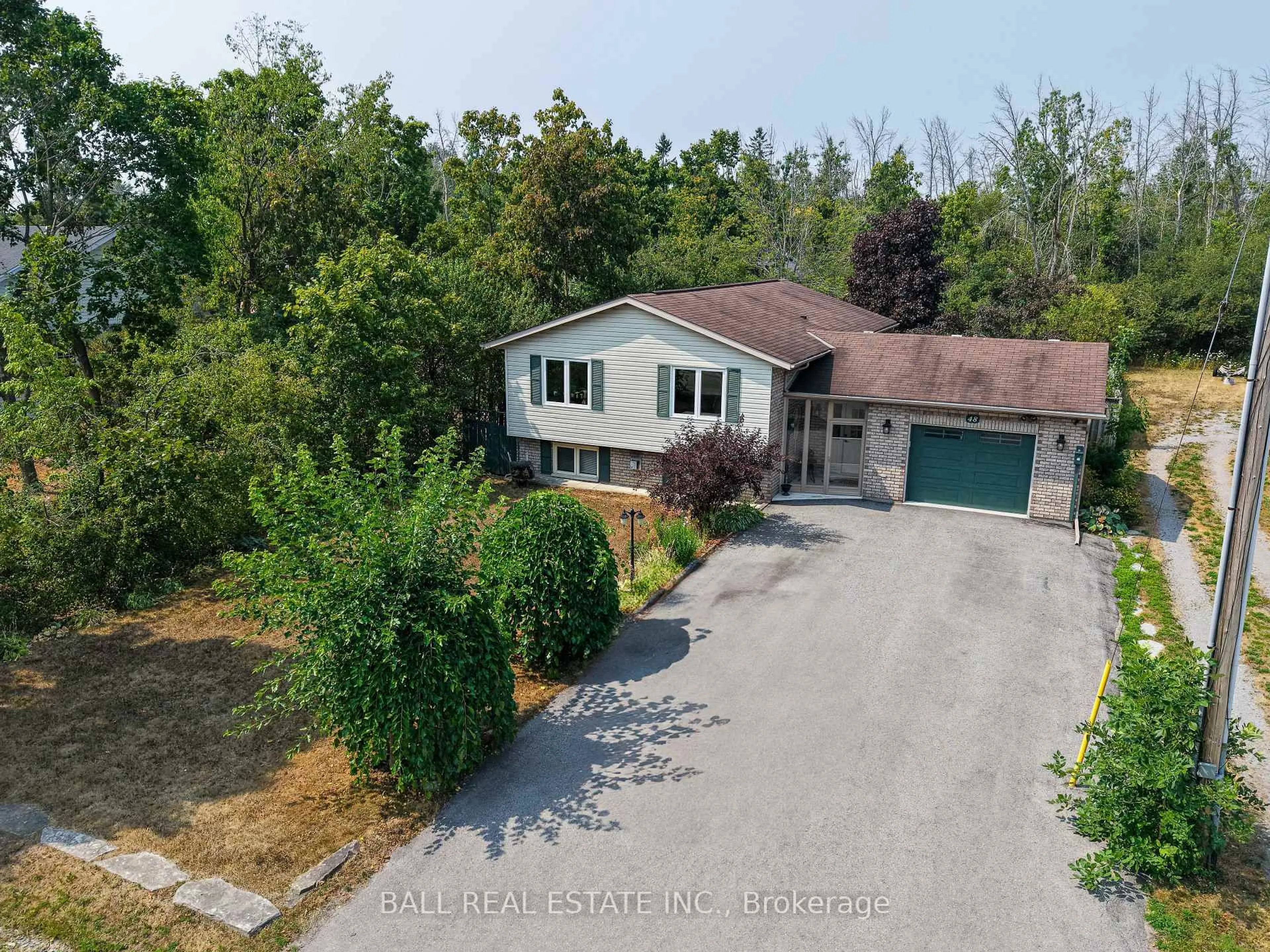 A pic from outside/outdoor area/front of a property/back of a property/a pic from drone, unknown for 48 Head St, Kawartha Lakes Ontario K0M 1A0
