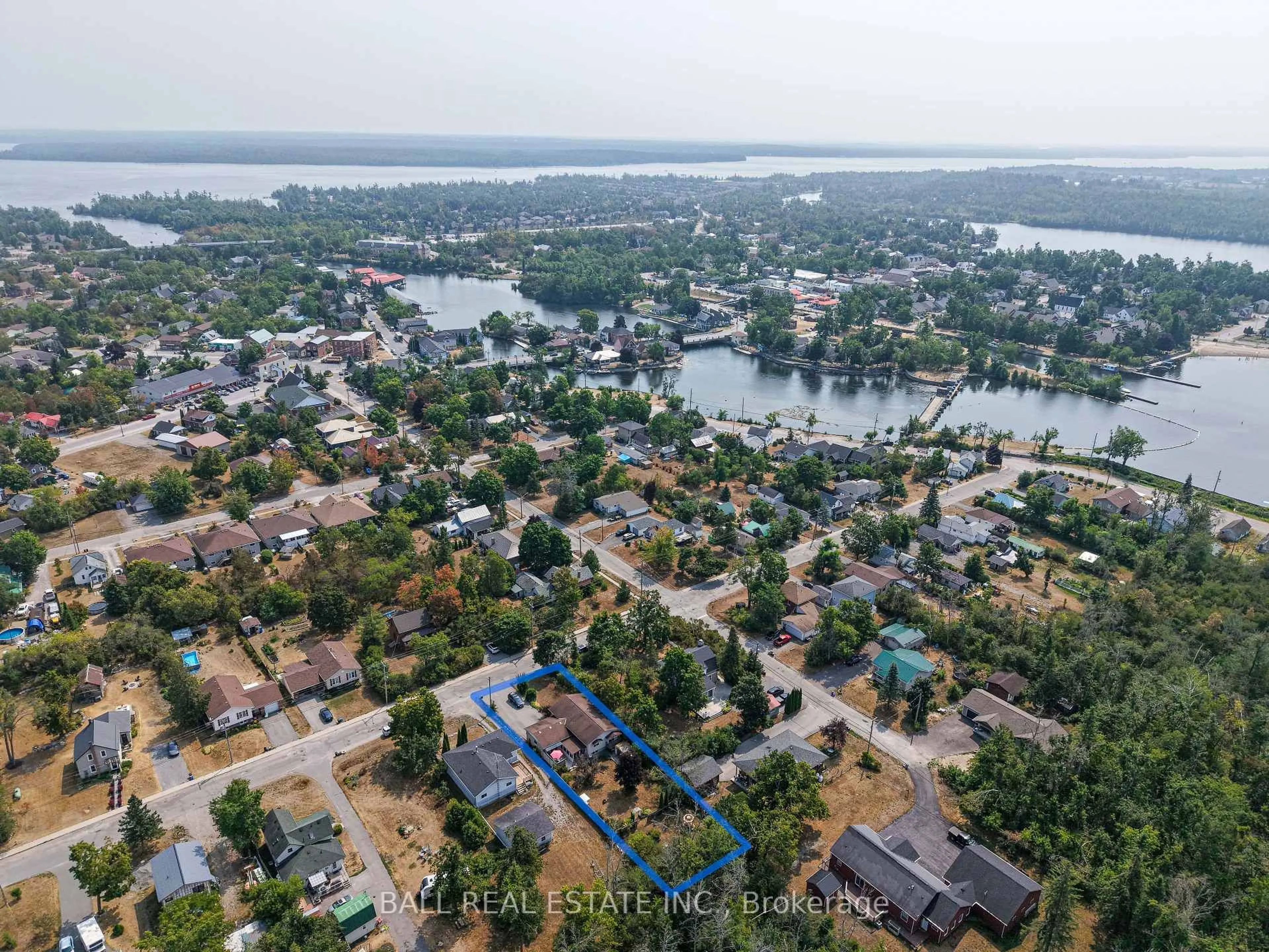 A pic from outside/outdoor area/front of a property/back of a property/a pic from drone, water/lake/river/ocean view for 48 Head St, Kawartha Lakes Ontario K0M 1A0