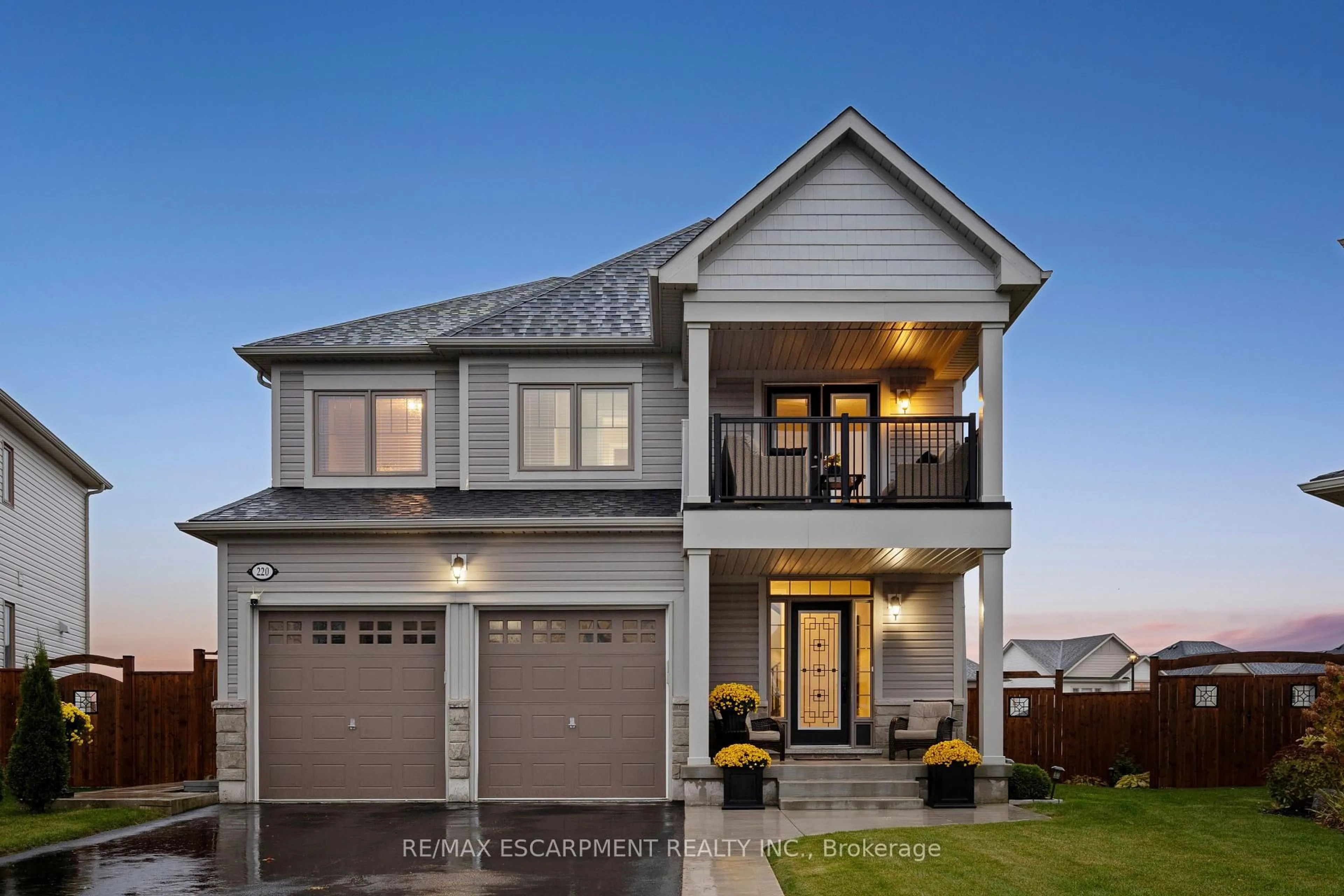 Home with vinyl exterior material, street for 220 Harpin Way, Centre Wellington Ontario N1M 2W3