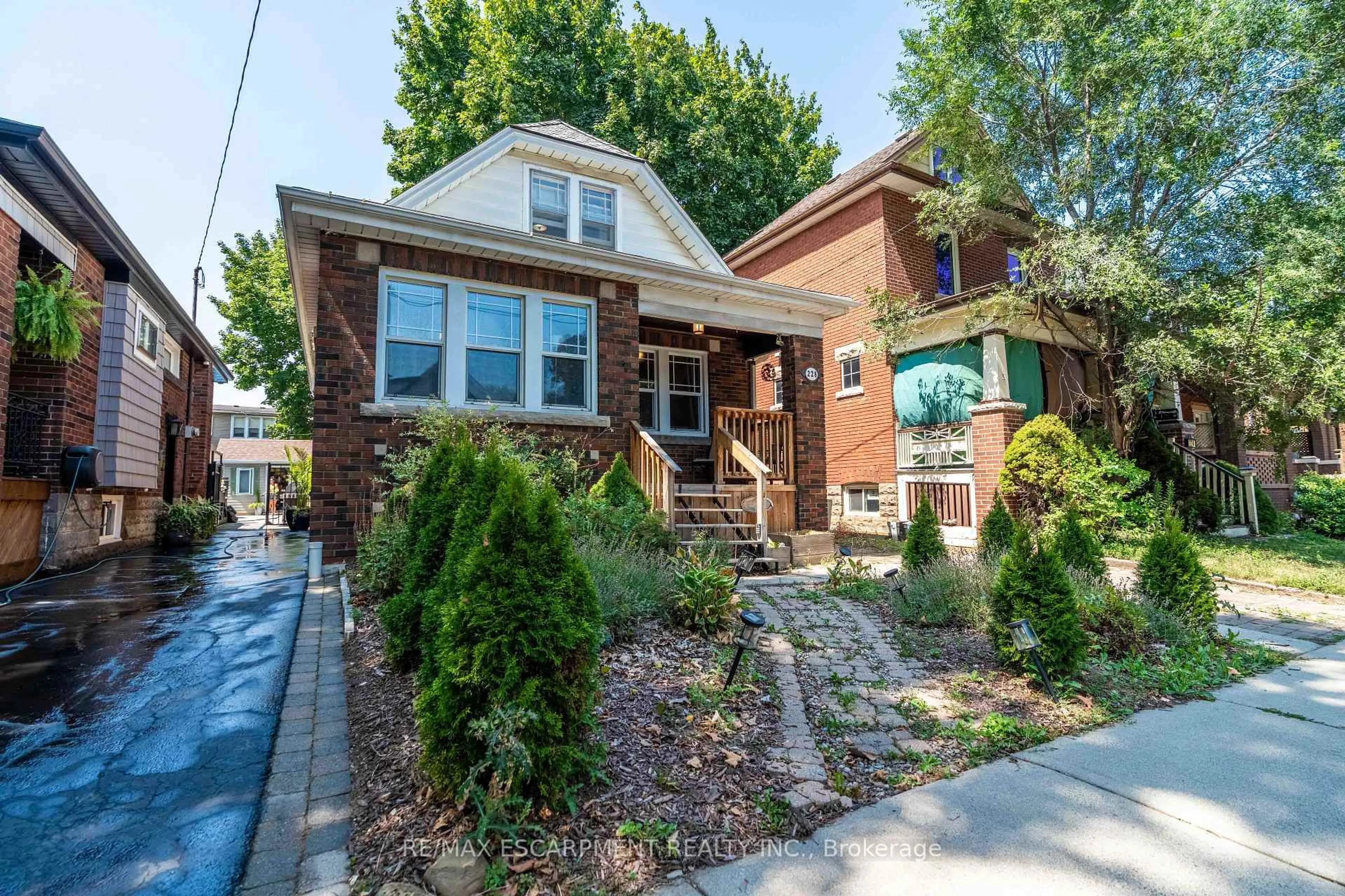 Home with brick exterior material, street for 228 Province St, Hamilton Ontario L8K 2L7