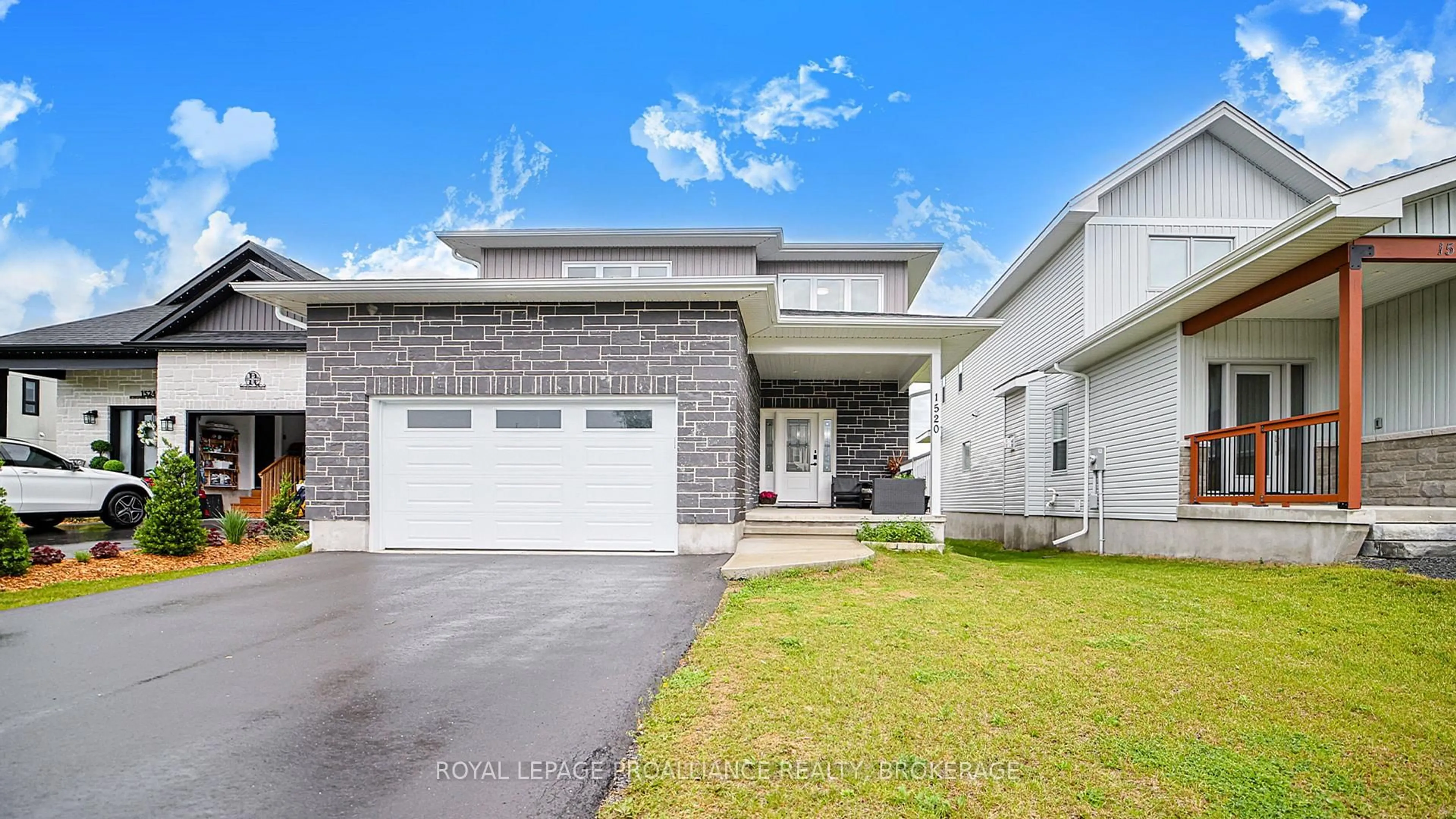 Home with vinyl exterior material, street for 1520 Berkshire Dr, Kingston Ontario K7P 0S7