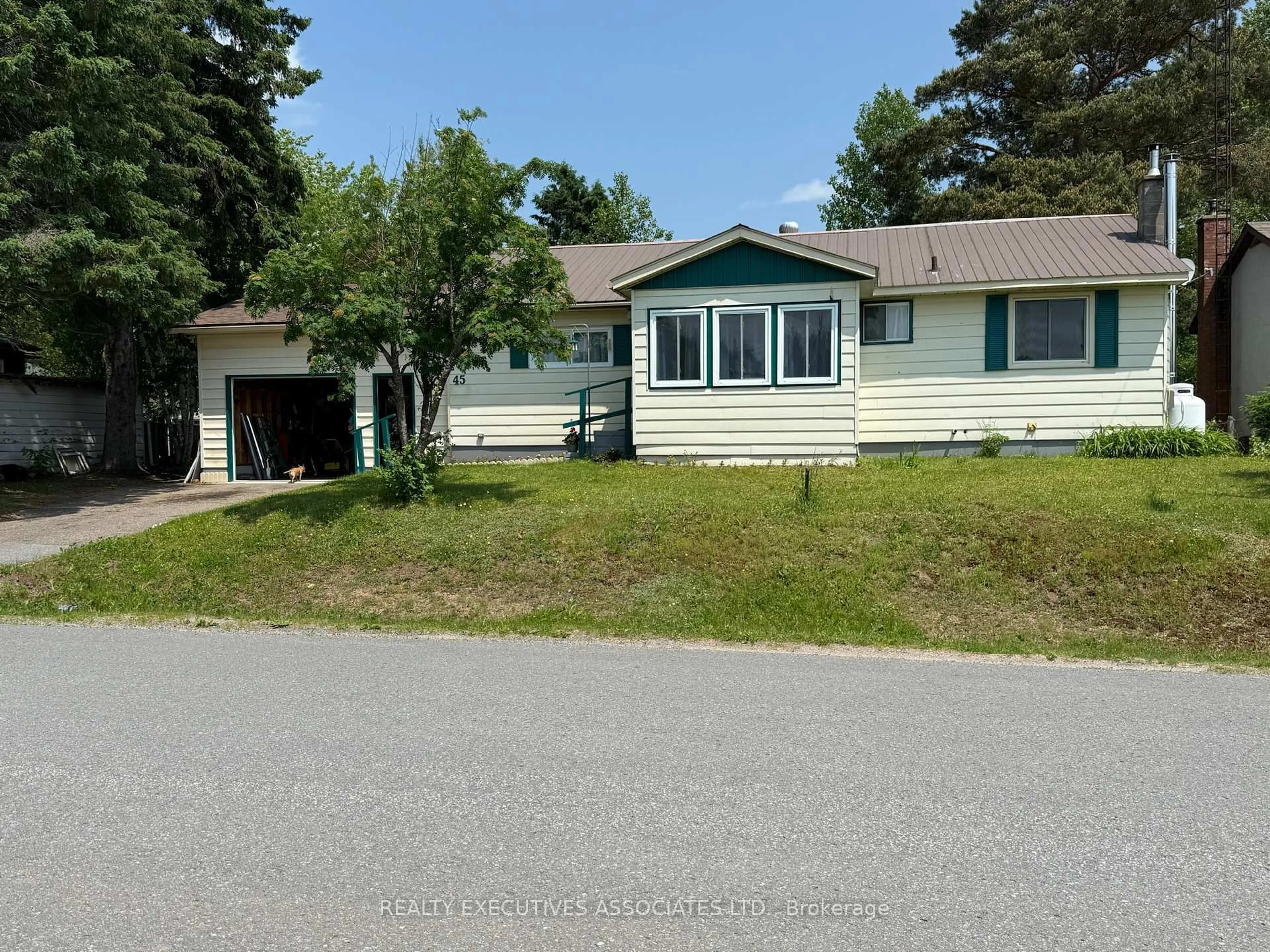 Home with vinyl exterior material, street for 45 Larch St, Highlands East Ontario K0L 1M0