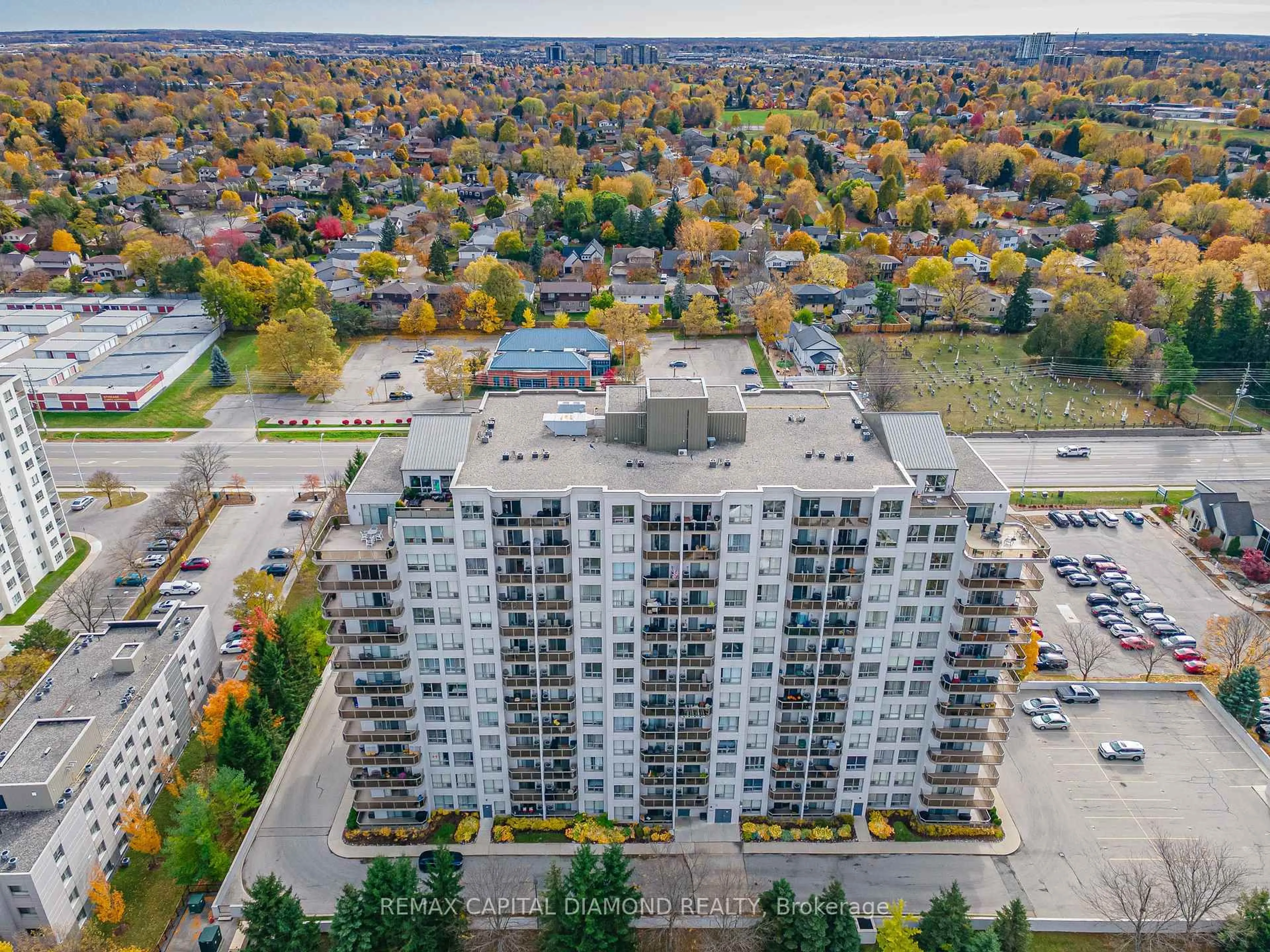 A pic from outside/outdoor area/front of a property/back of a property/a pic from drone, city buildings view from balcony for 353 Commissioners Rd #506, London South Ontario N6J 0A3