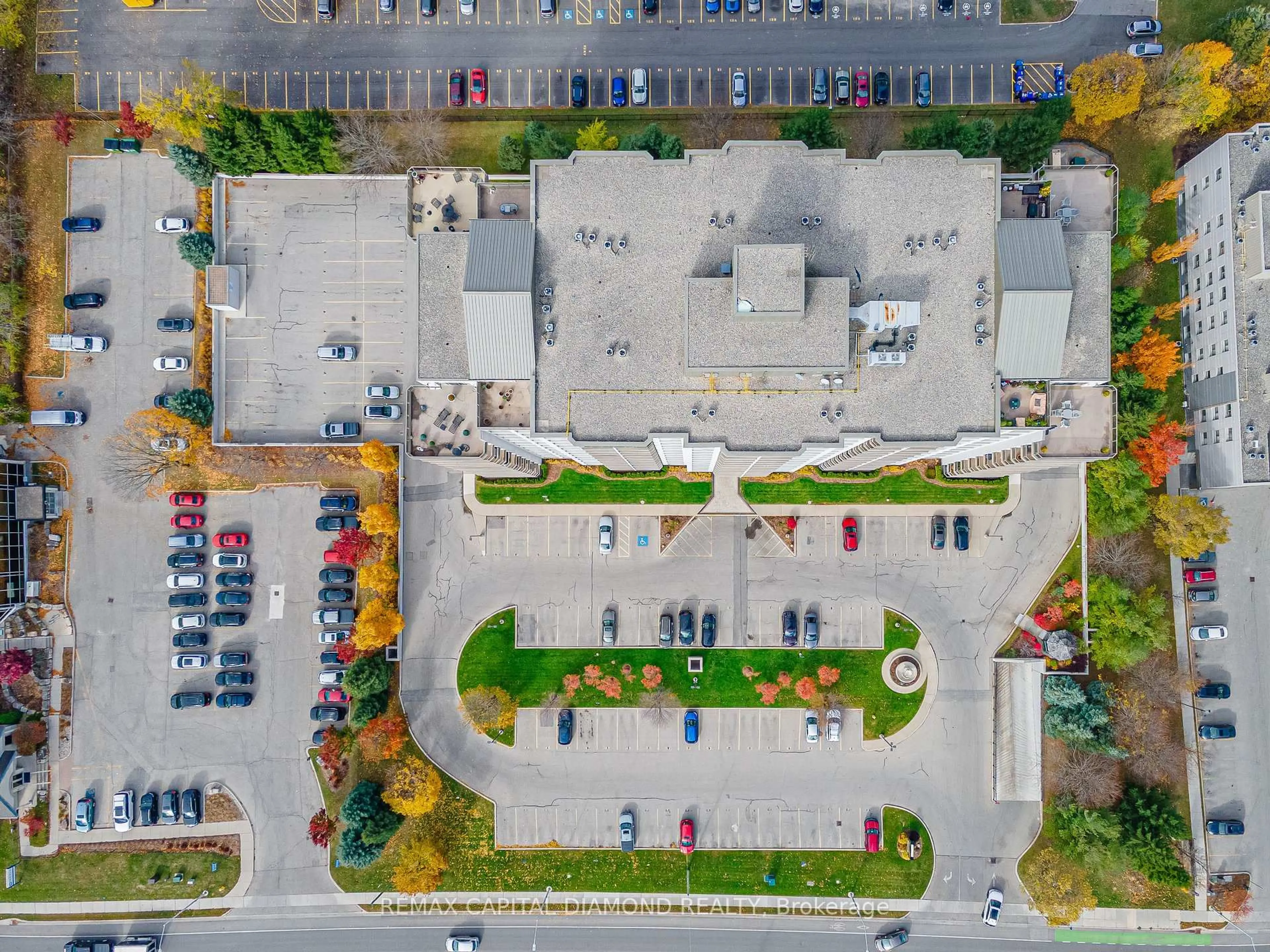 A pic from outside/outdoor area/front of a property/back of a property/a pic from drone, street for 353 Commissioners Rd #506, London South Ontario N6J 0A3