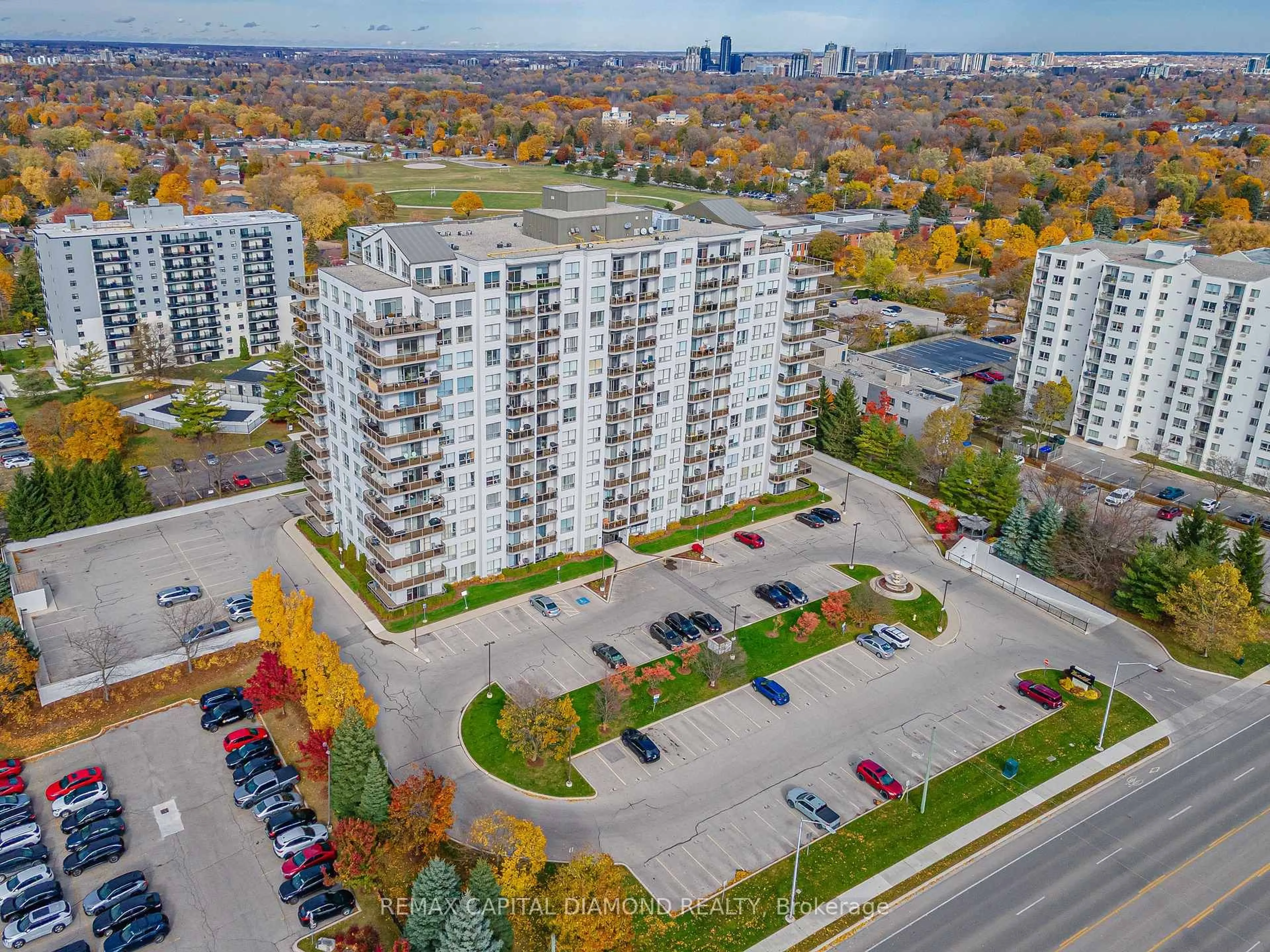 A pic from outside/outdoor area/front of a property/back of a property/a pic from drone, city buildings view from balcony for 353 Commissioners Rd #506, London South Ontario N6J 0A3