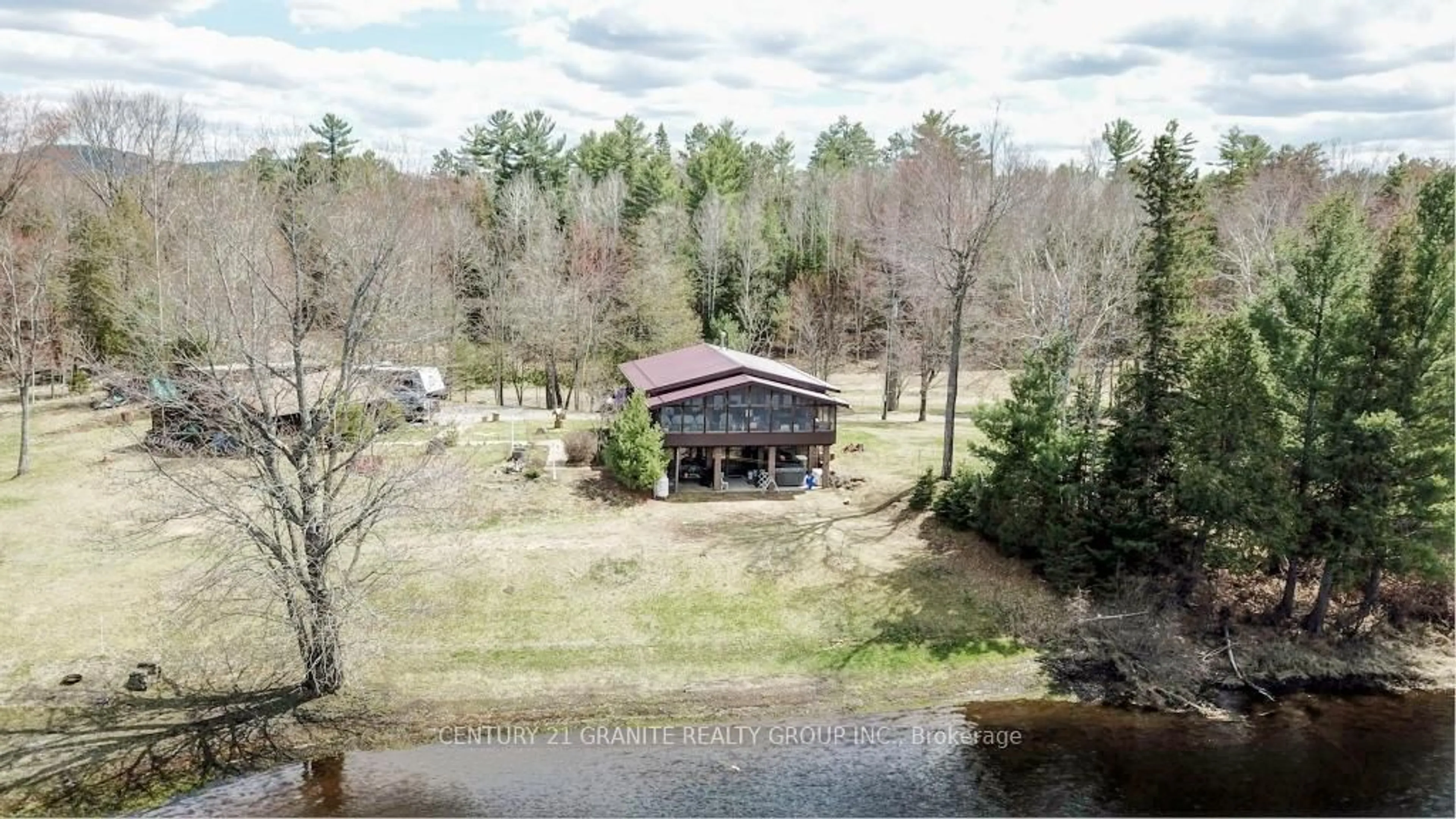 A pic from outside/outdoor area/front of a property/back of a property/a pic from drone, water/lake/river/ocean view for 230 RIVER BEND Dr, Palmer Rapids Ontario K0J 2E0