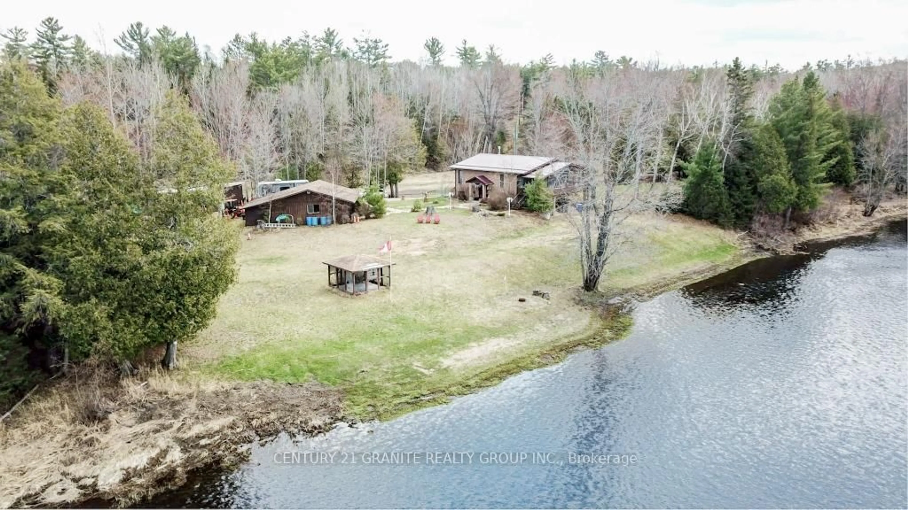 A pic from outside/outdoor area/front of a property/back of a property/a pic from drone, water/lake/river/ocean view for 230 RIVER BEND Dr, Palmer Rapids Ontario K0J 2E0