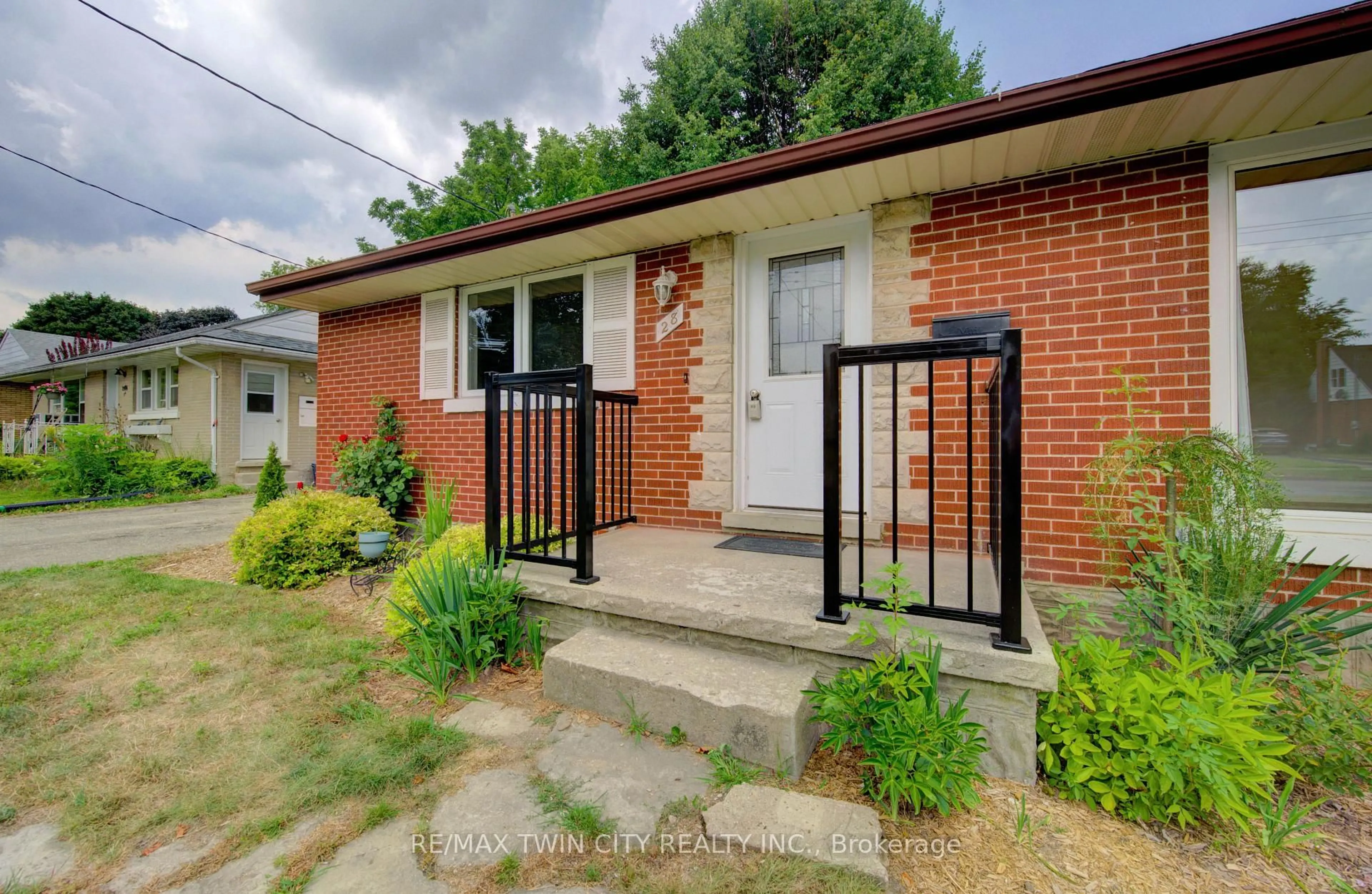 Home with brick exterior material, street for 28 Jack Ave, Kitchener Ontario N2M 1Z8