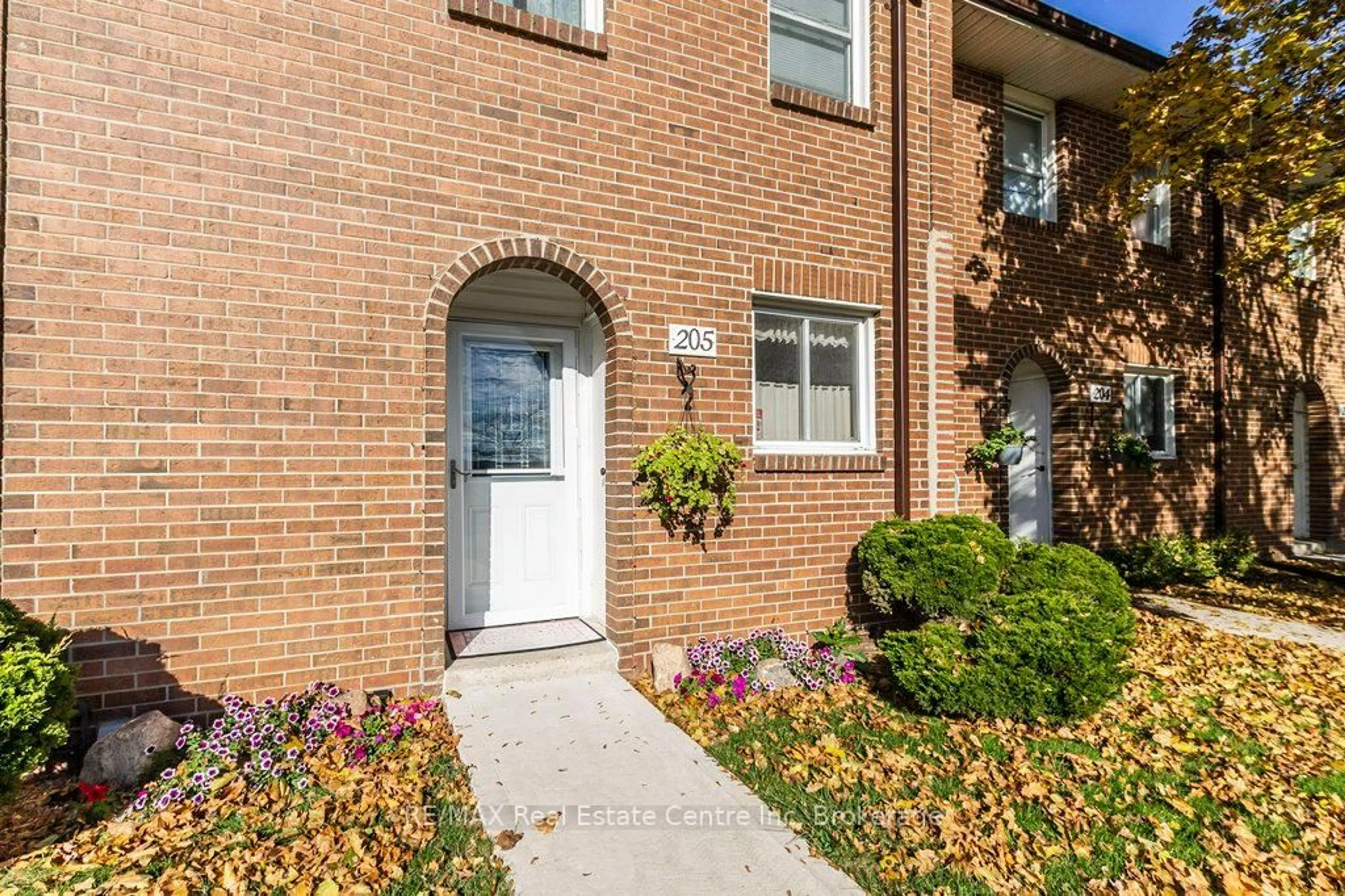 Home with brick exterior material, street for 31 Greengate Rd #205, Guelph Ontario N1H 6R3