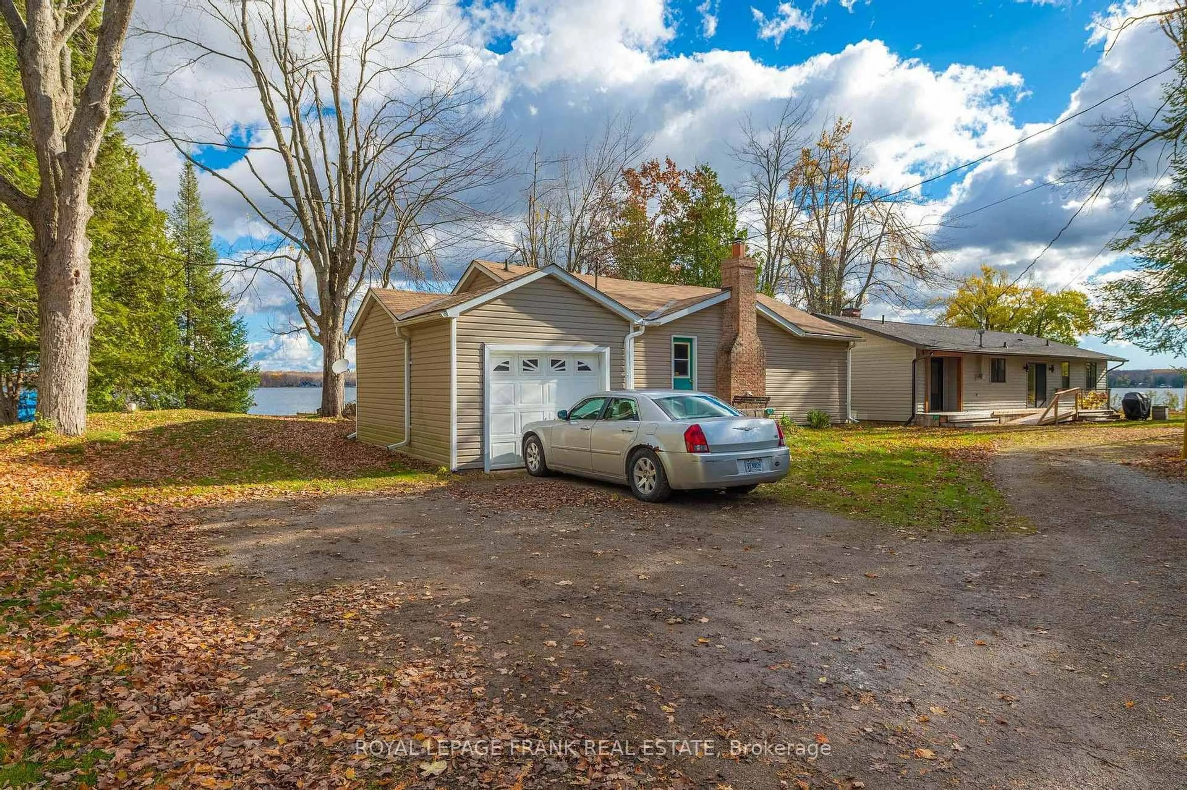 A pic from outside/outdoor area/front of a property/back of a property/a pic from drone, water/lake/river/ocean view for 175 Fire Route 26, Trent Lakes Ontario K0L 1J0