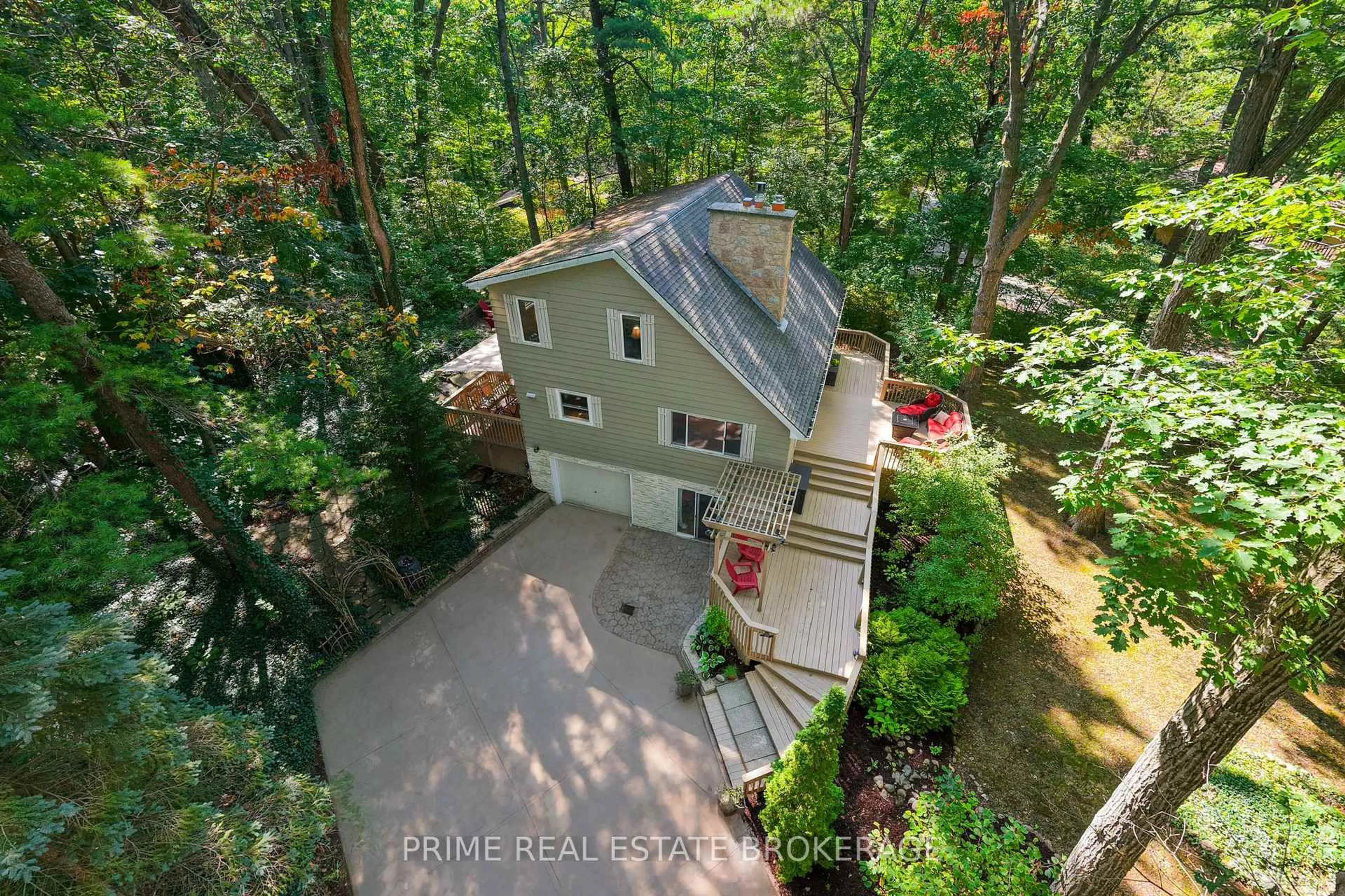 A pic from outside/outdoor area/front of a property/back of a property/a pic from drone, forest/trees view for 10257 Woodpark Crt, Lambton Shores Ontario N0M 1T0