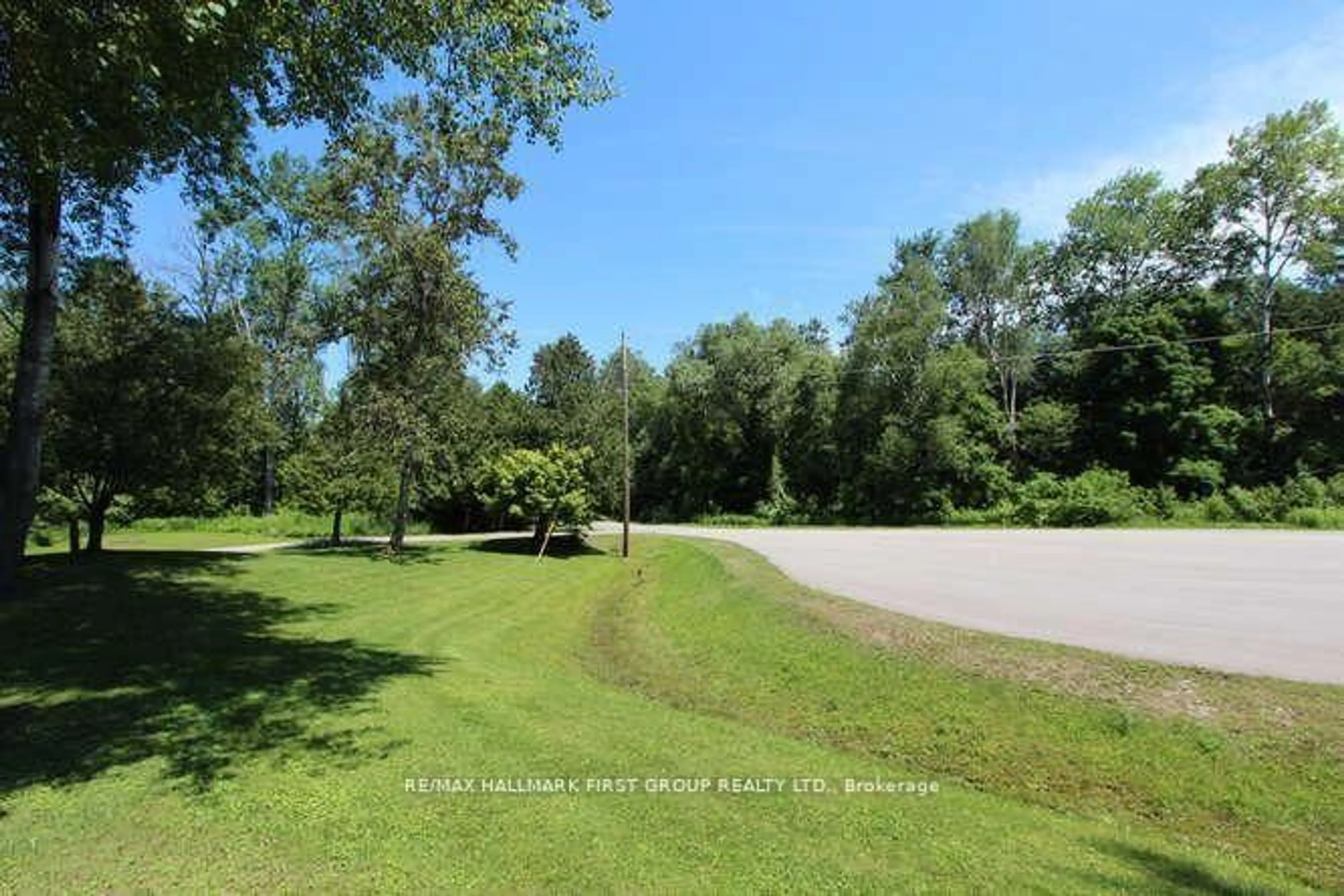 A pic from outside/outdoor area/front of a property/back of a property/a pic from drone, forest/trees view for 715 Whitebirch Rd, Cavan Monaghan Ontario L0A 1G0