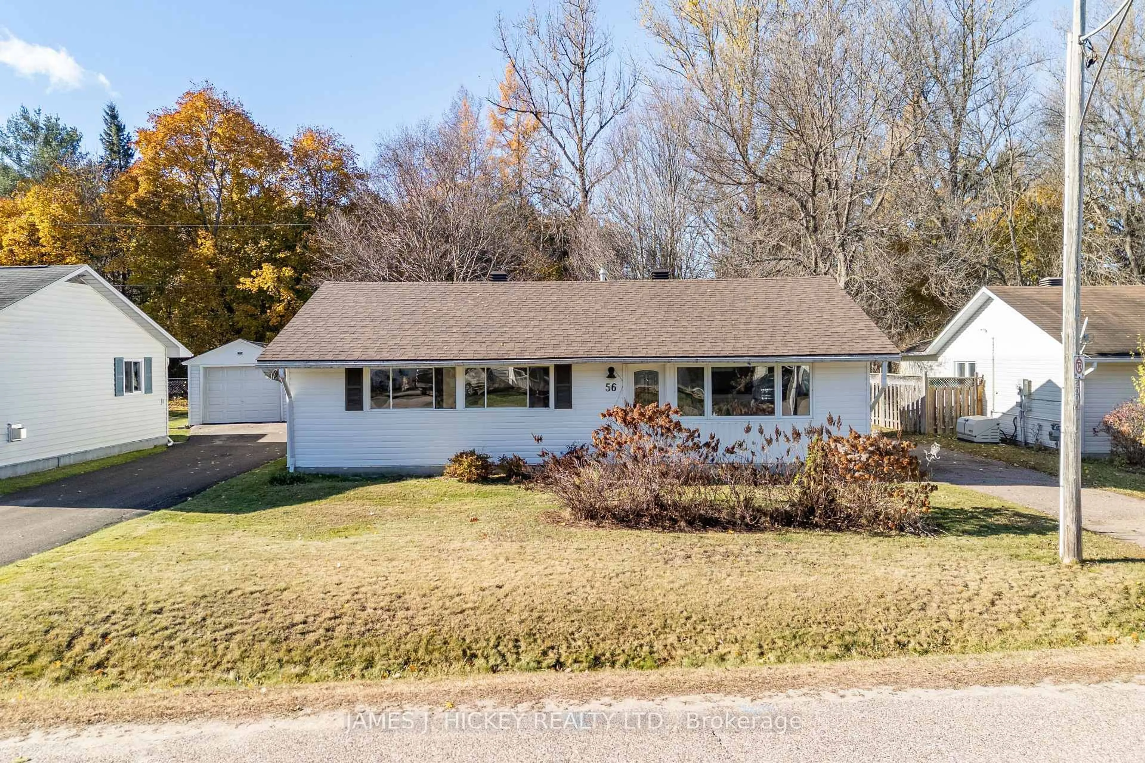 Home with vinyl exterior material, street for 56 Beach Ave, Deep River Ontario K0J 1P0