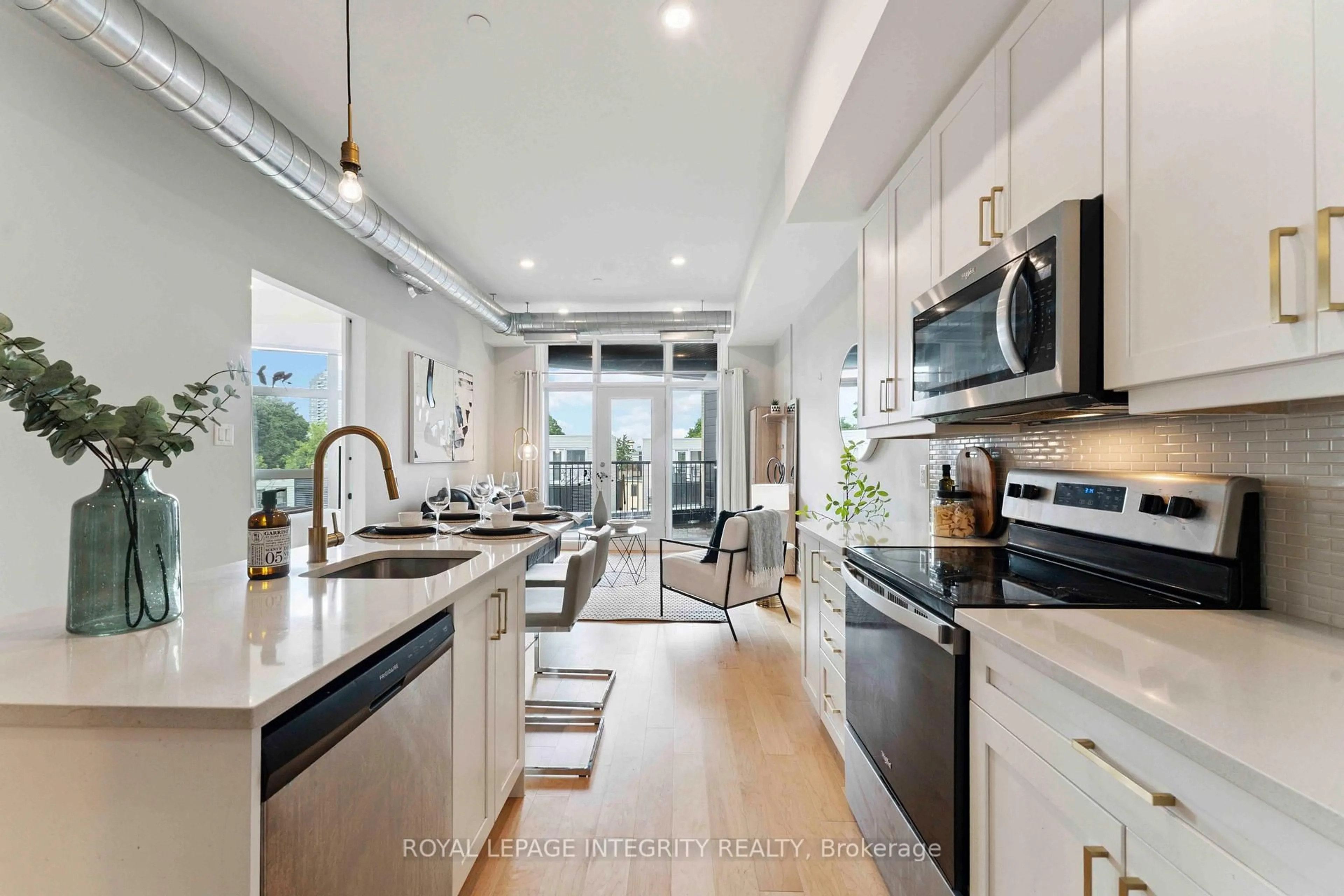 Open concept kitchen, ceramic/tile floor for 101 Pinhey St #302, Ottawa Ontario K1Y 1T7