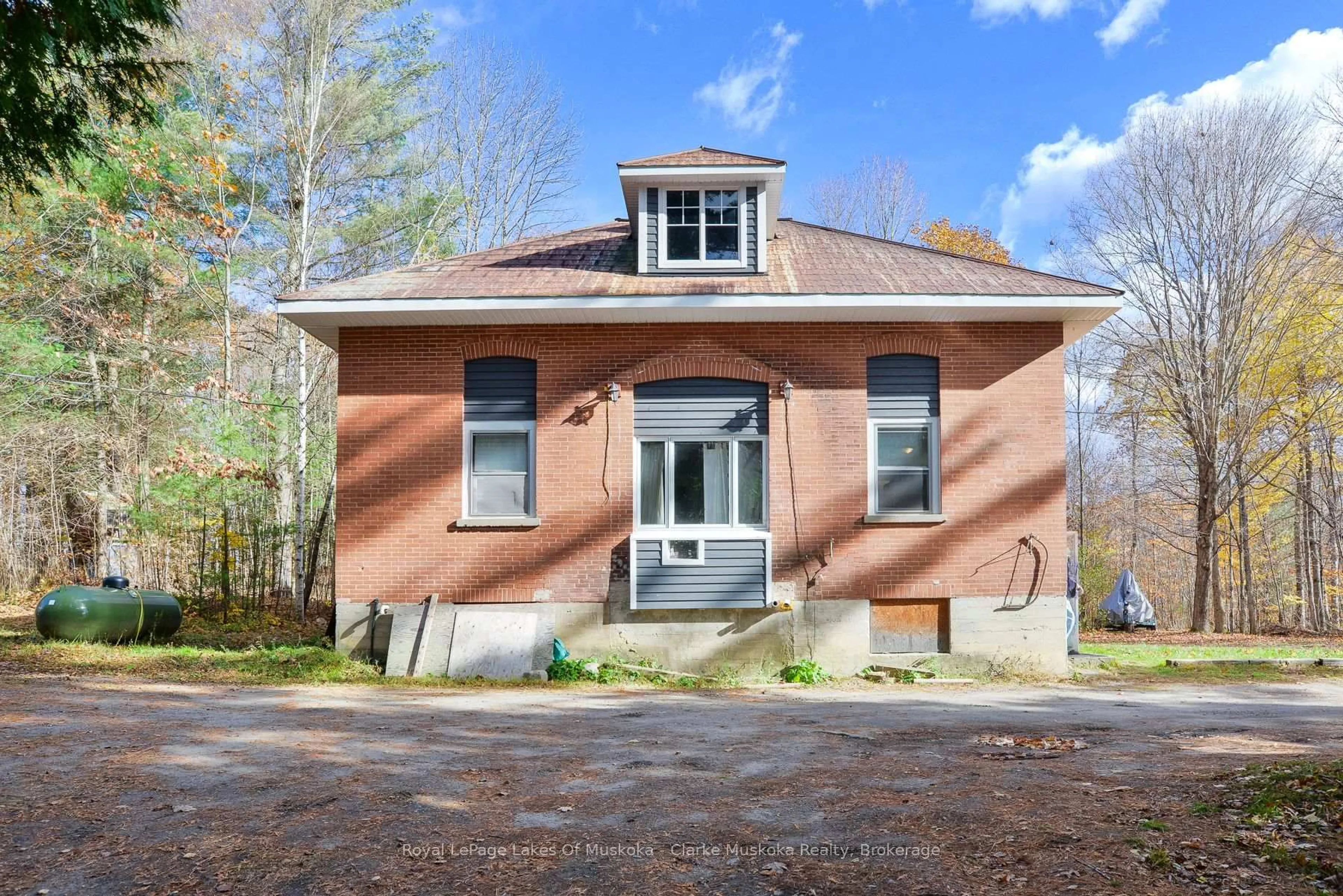 Home with brick exterior material, street for 2026 Peninsula Rd, Muskoka Lakes Ontario P0B 1G0