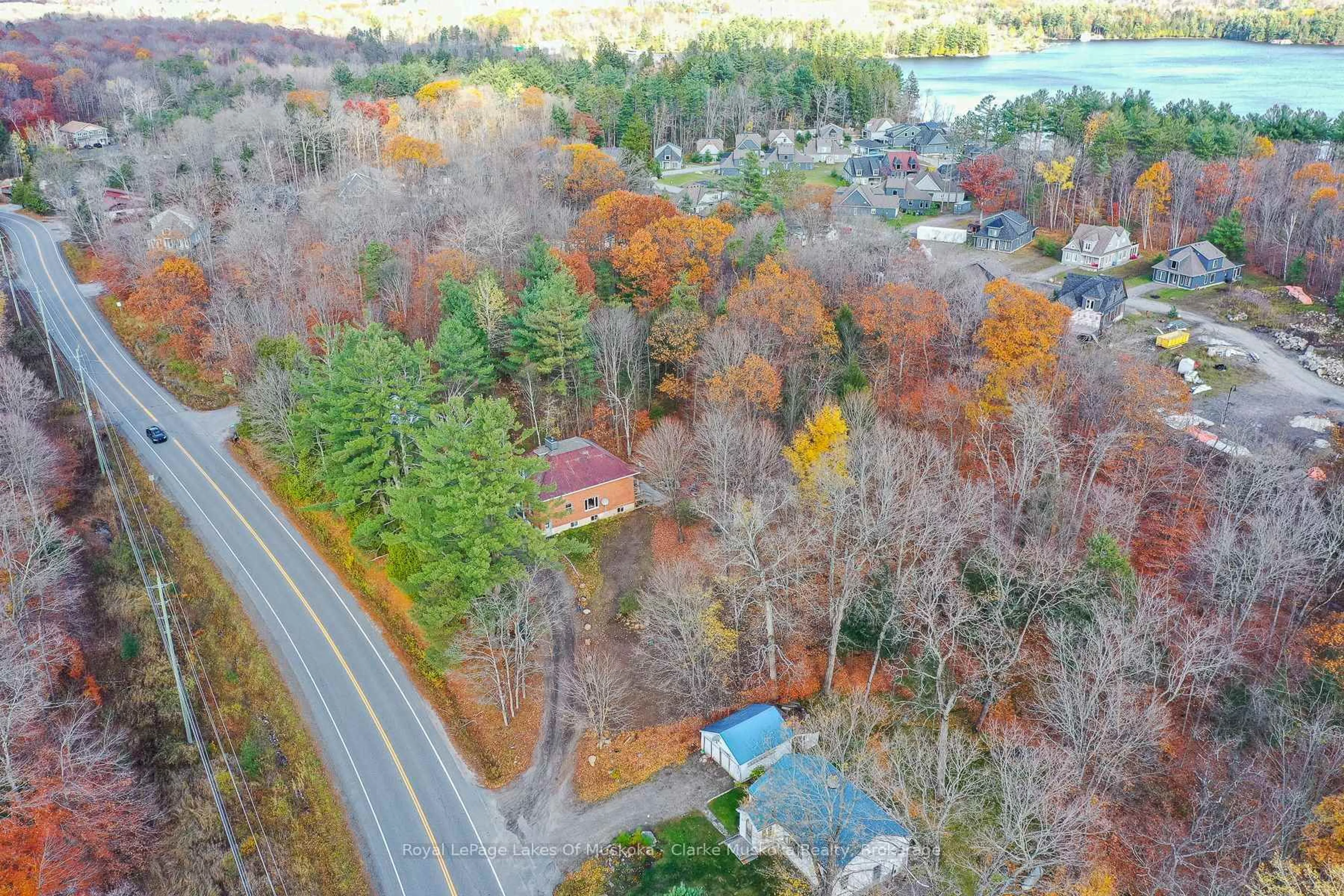 A pic from outside/outdoor area/front of a property/back of a property/a pic from drone, forest/trees view for 2026 Peninsula Rd, Muskoka Lakes Ontario P0B 1G0